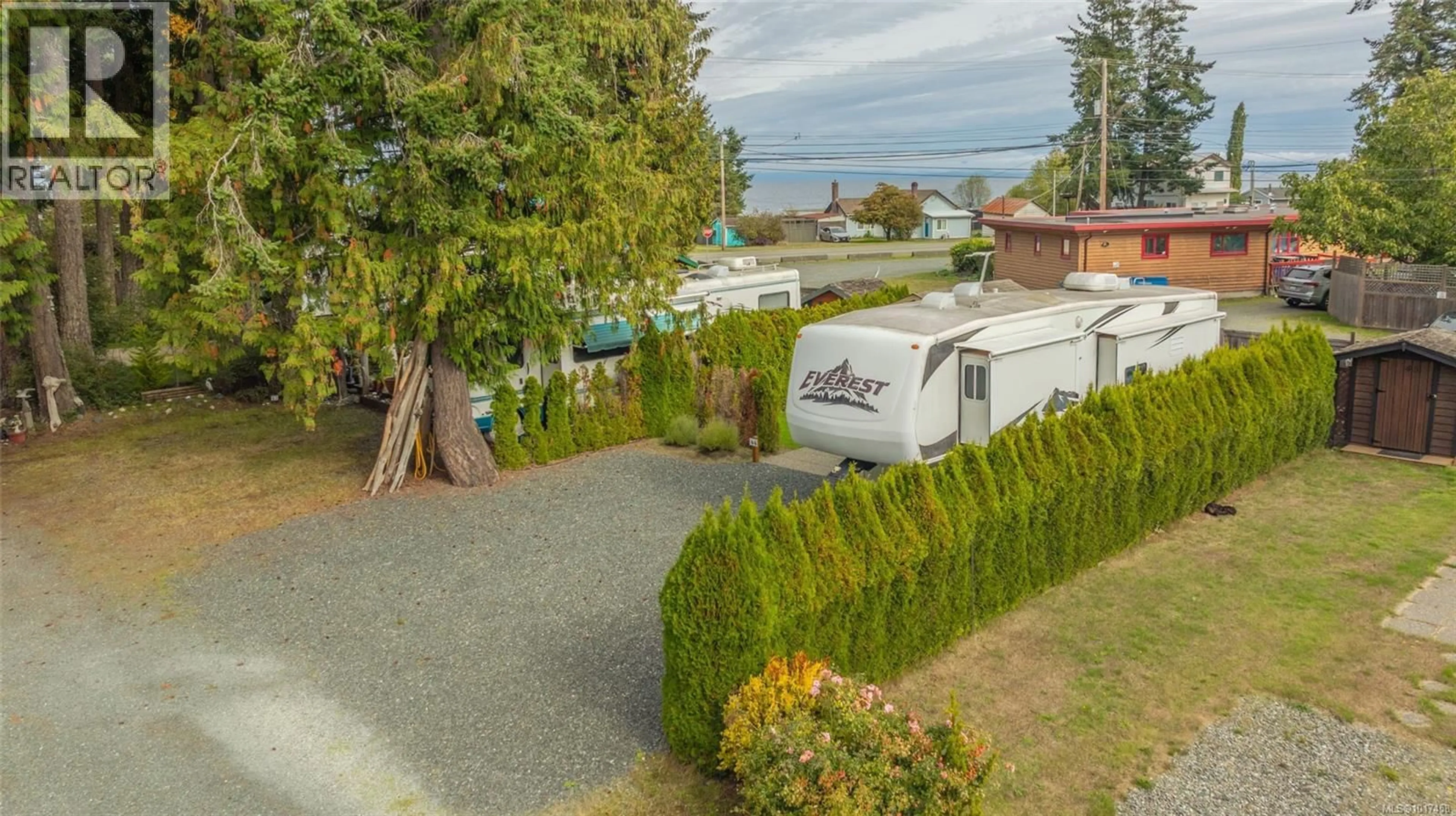 A pic from outside/outdoor area/front of a property/back of a property/a pic from drone, water/lake/river/ocean view for 44 - 6050 ISLAND HIGHWAY, Qualicum Beach British Columbia V9K2E1