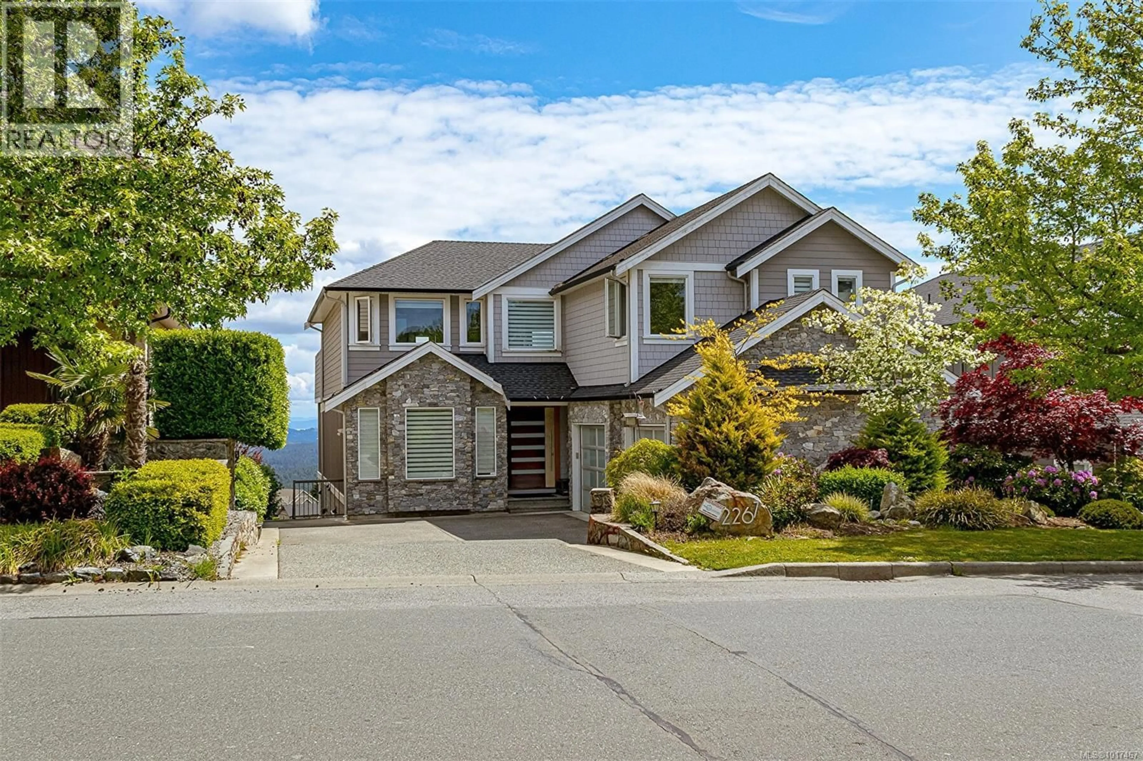 Home with vinyl exterior material, street for 2267 NICKLAUS DRIVE, Langford British Columbia V9B0L2