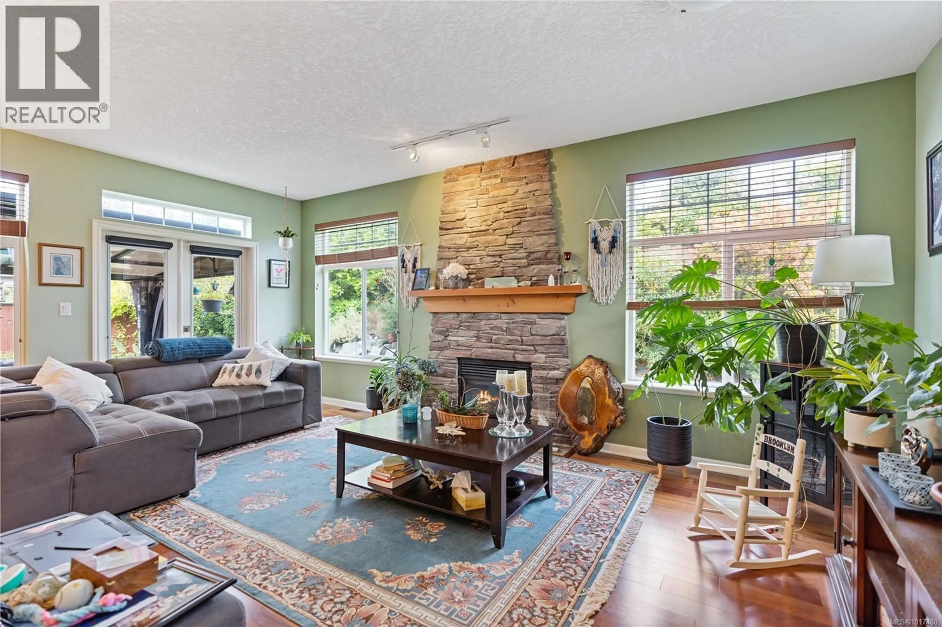 Living room with furniture, ceramic/tile floor for 6442 BIRCHVIEW WAY, Sooke British Columbia V9Z1J9