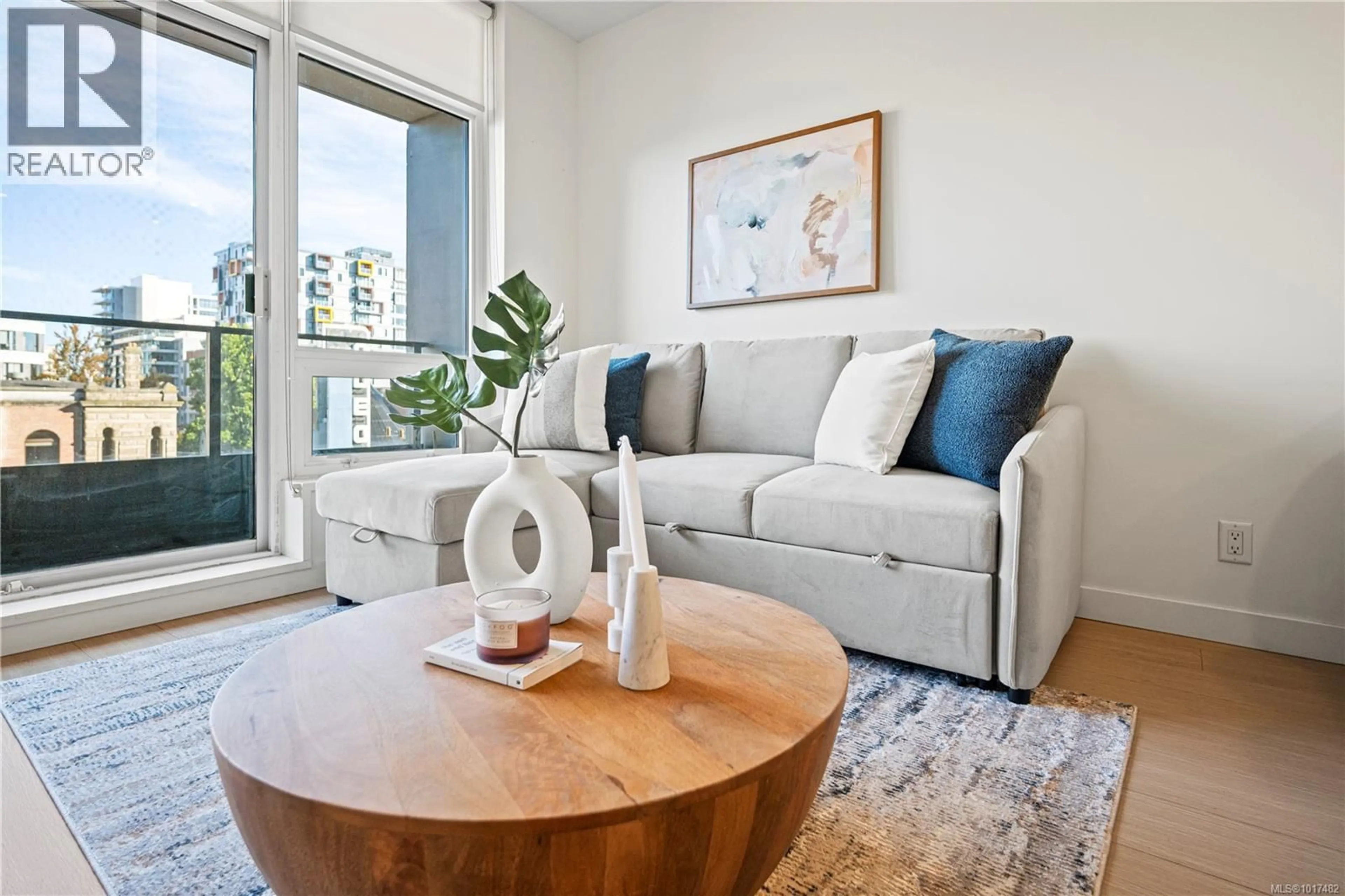 Living room with furniture, wood/laminate floor for 404 - 728 YATES STREET, Victoria British Columbia V8W3S2