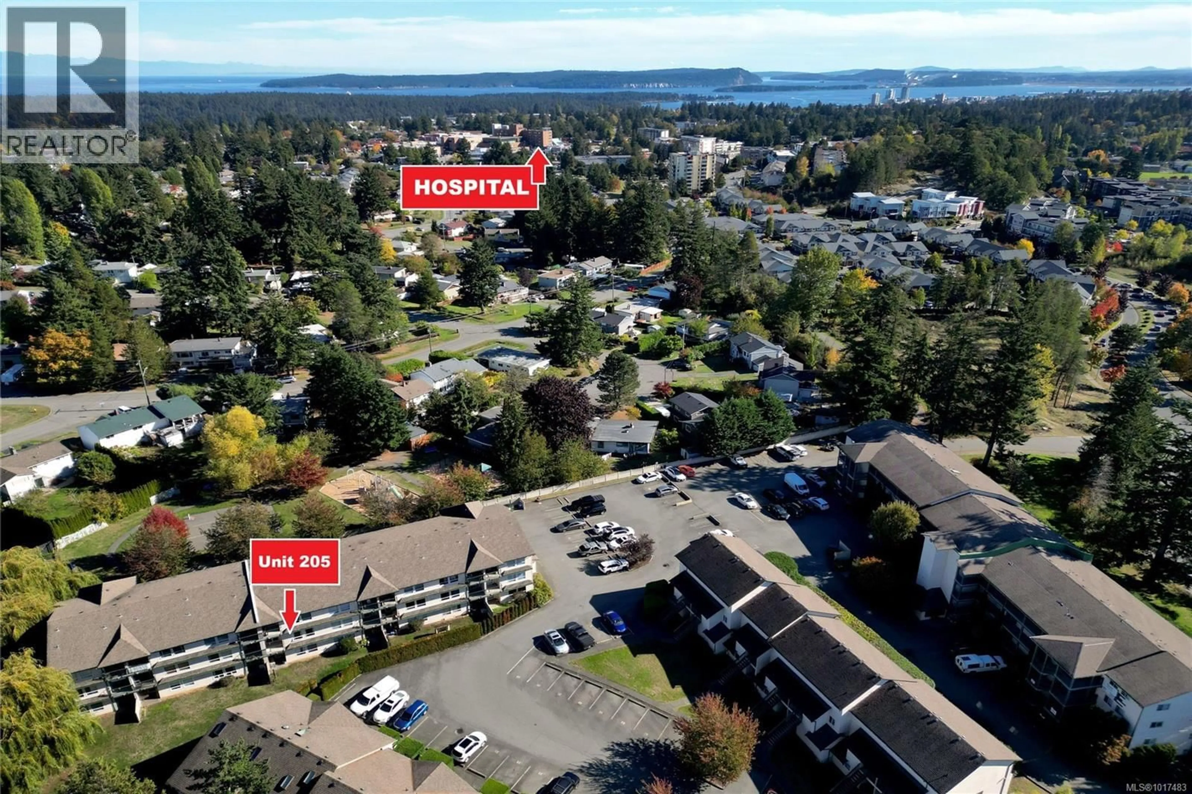 A pic from outside/outdoor area/front of a property/back of a property/a pic from drone, unknown for 205 - 1912 BOWEN ROAD, Nanaimo British Columbia V9S5S6