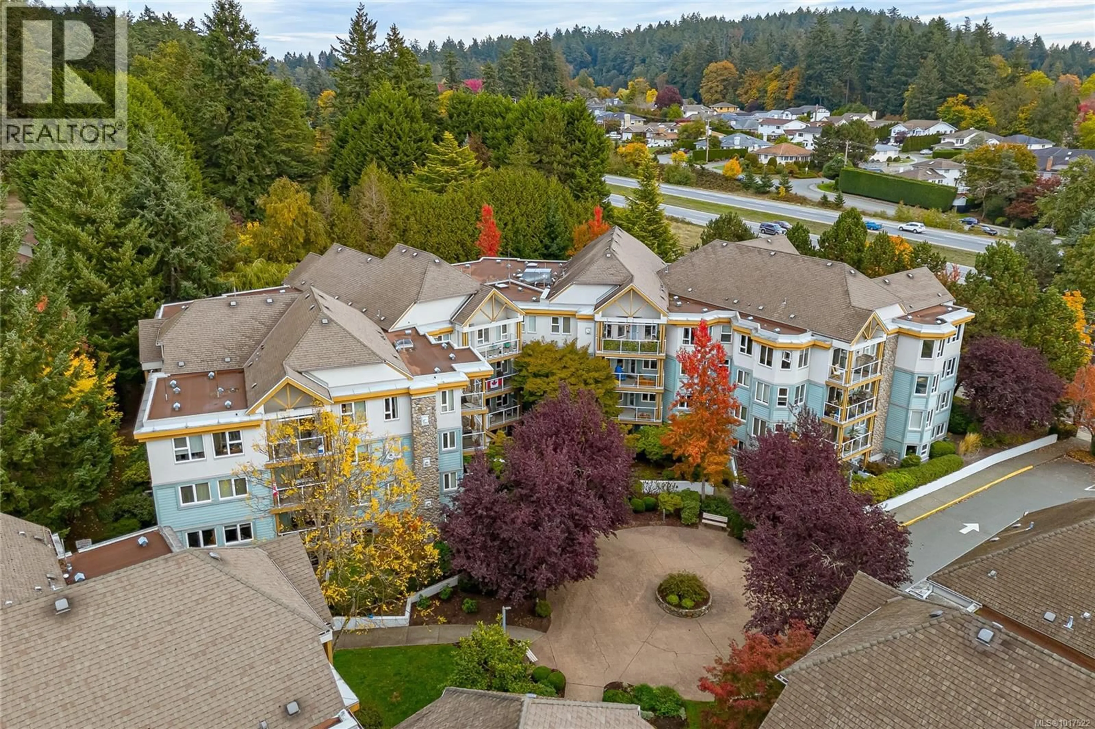 A pic from outside/outdoor area/front of a property/back of a property/a pic from drone, unknown for 211 - 490 MARSETT PLACE, Saanich British Columbia V8Z7J1