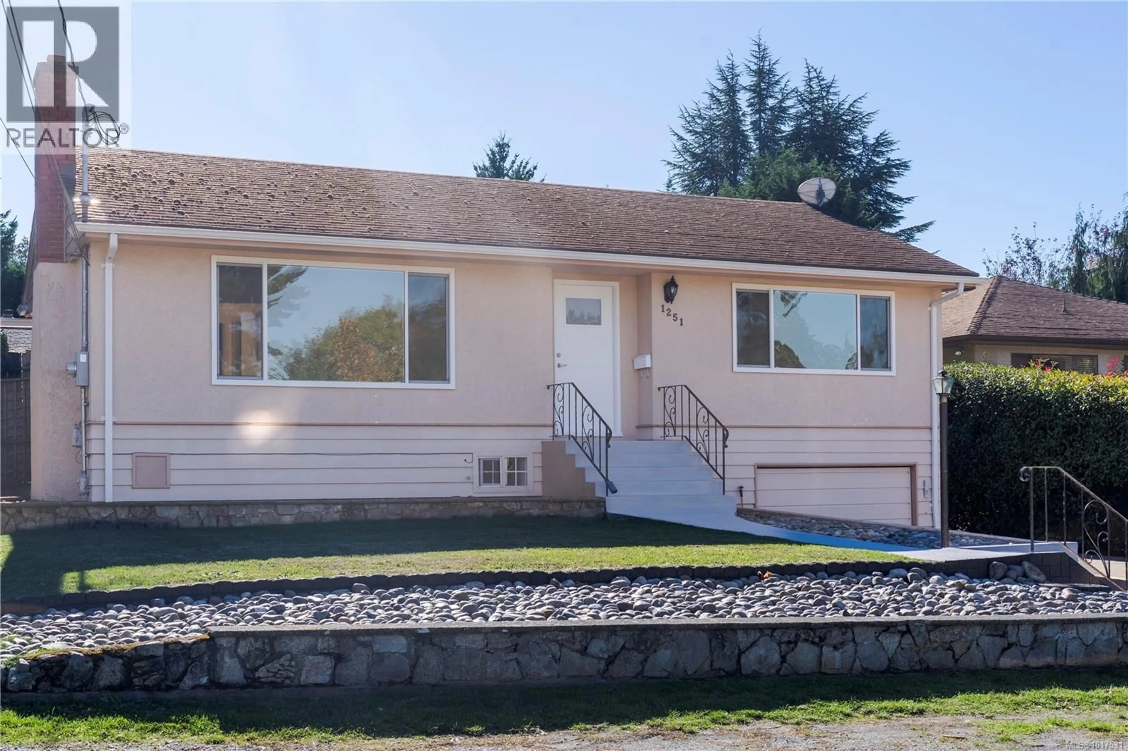 Home with vinyl exterior material, street for 1251 GARKIL ROAD, Saanich British Columbia V8P2L2