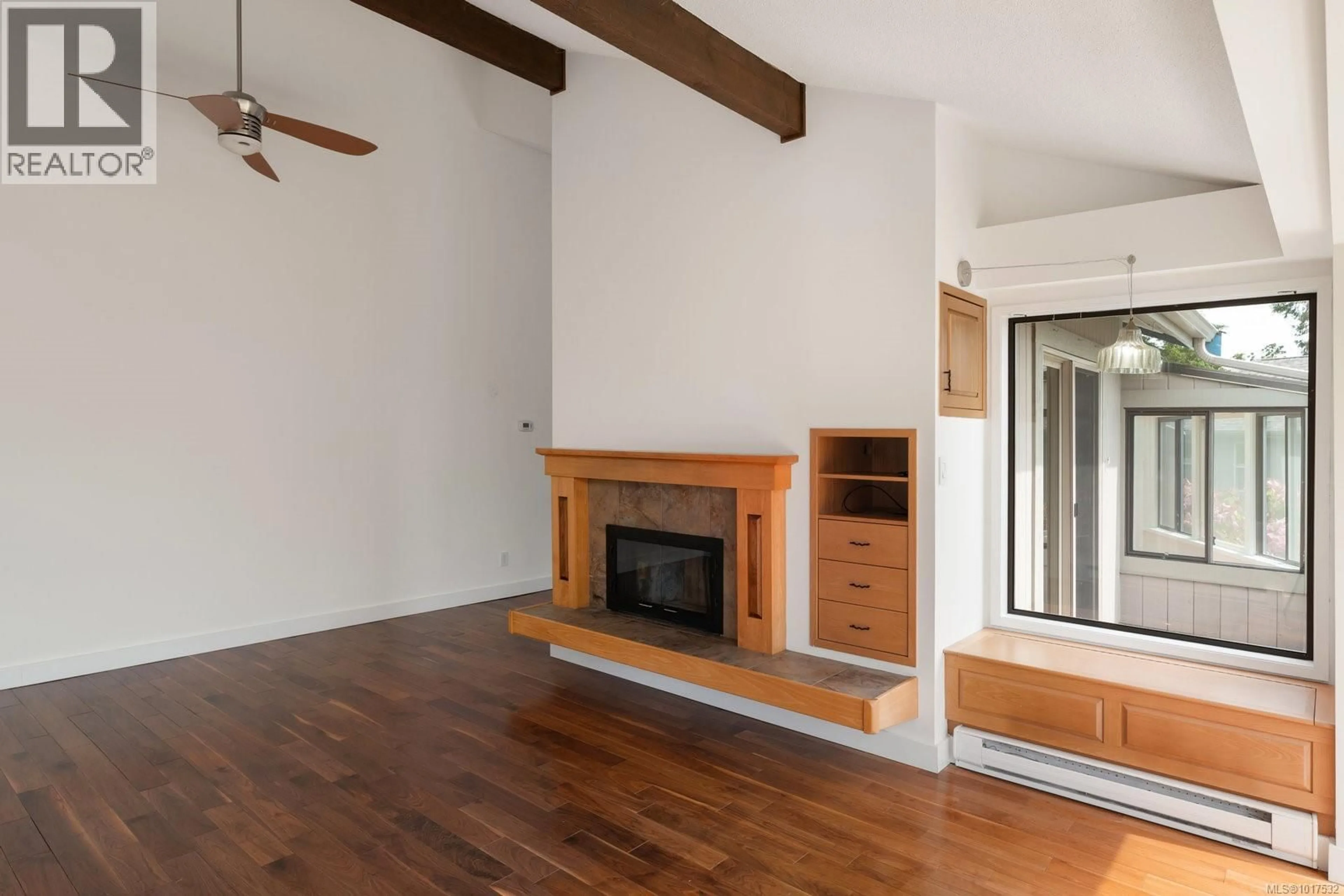 Living room with furniture, wood/laminate floor for 3 - 2654 LANCELOT PLACE, Central Saanich British Columbia V8M1V3