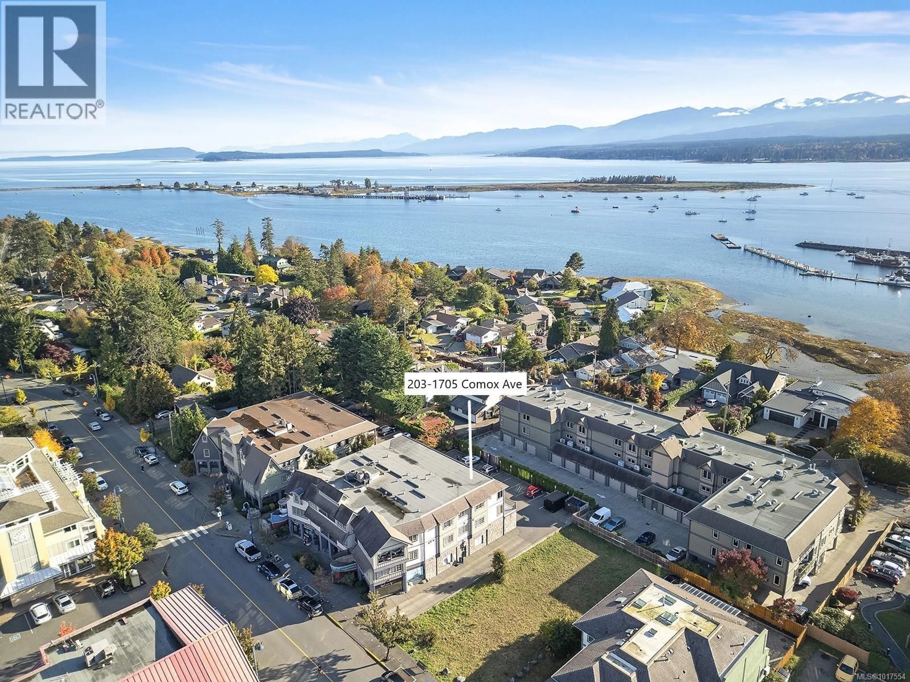A pic from outside/outdoor area/front of a property/back of a property/a pic from drone, water/lake/river/ocean view for 203 - 1705 COMOX AVENUE, Comox British Columbia V9M3M1