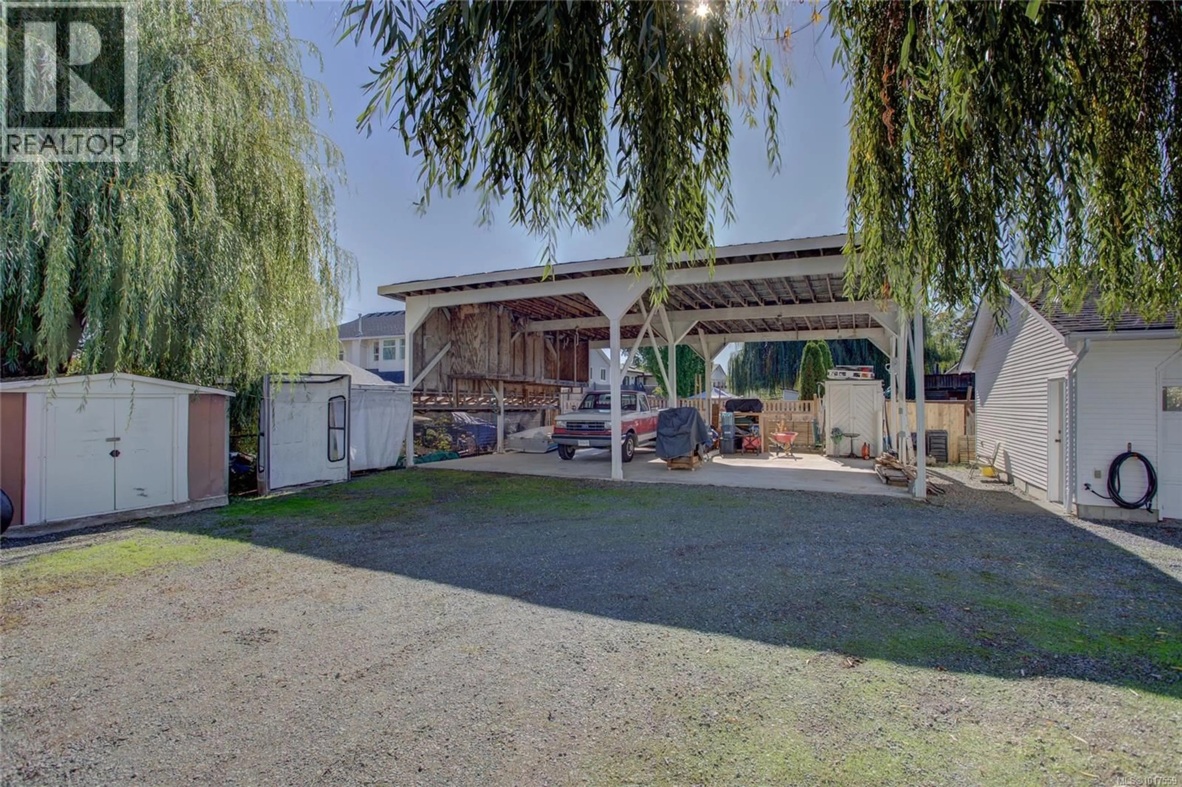 A pic from outside/outdoor area/front of a property/back of a property/a pic from drone, street for 3314 AUCHINACHIE ROAD, Duncan British Columbia V9L3Z9