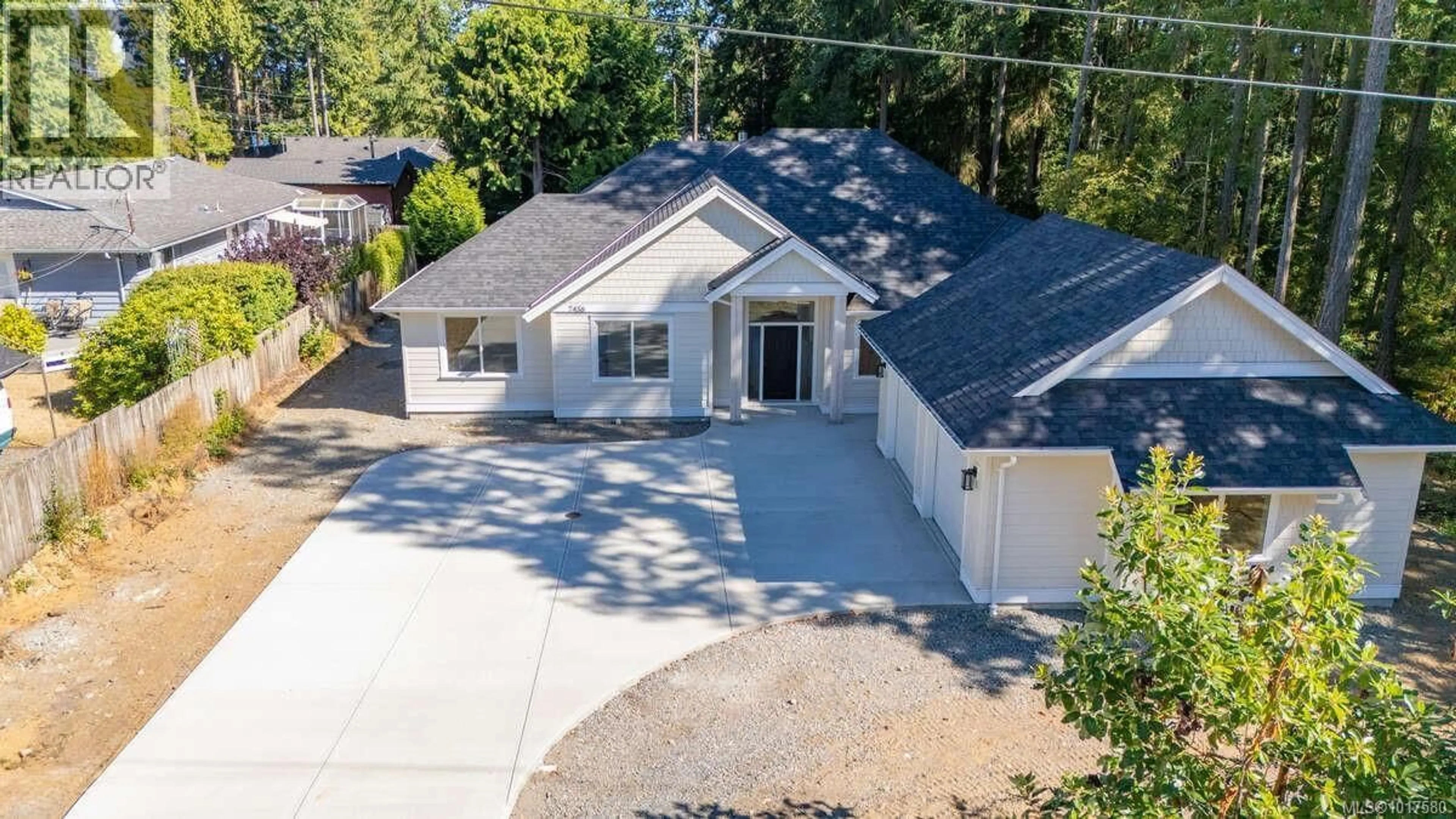 A pic from outside/outdoor area/front of a property/back of a property/a pic from drone, street for 7436 LANTZVILLE ROAD, Lantzville British Columbia V0R2H0