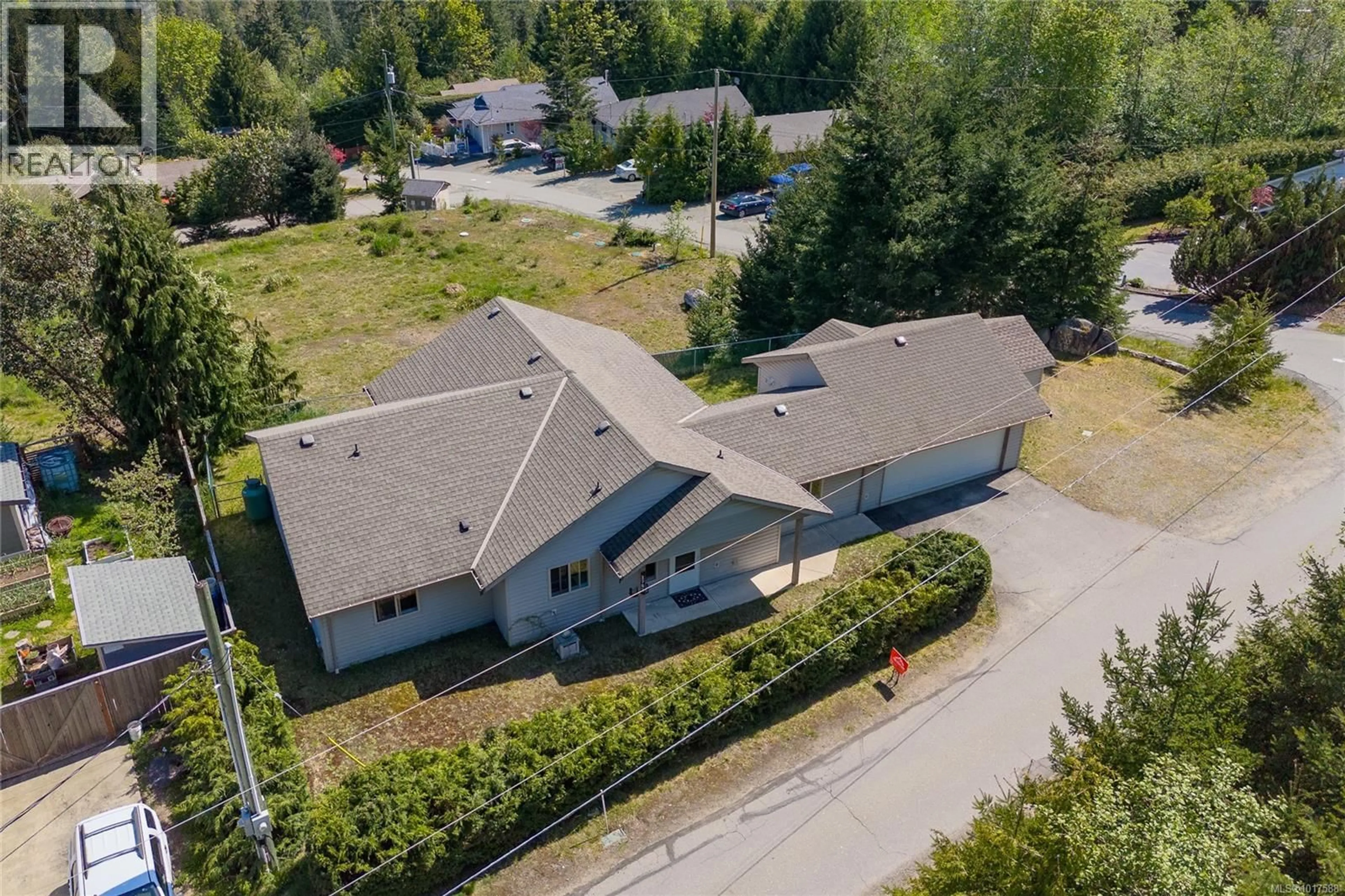 A pic from outside/outdoor area/front of a property/back of a property/a pic from drone, unknown for 1782 MARTINI WAY, Qualicum Beach British Columbia V9K2S3