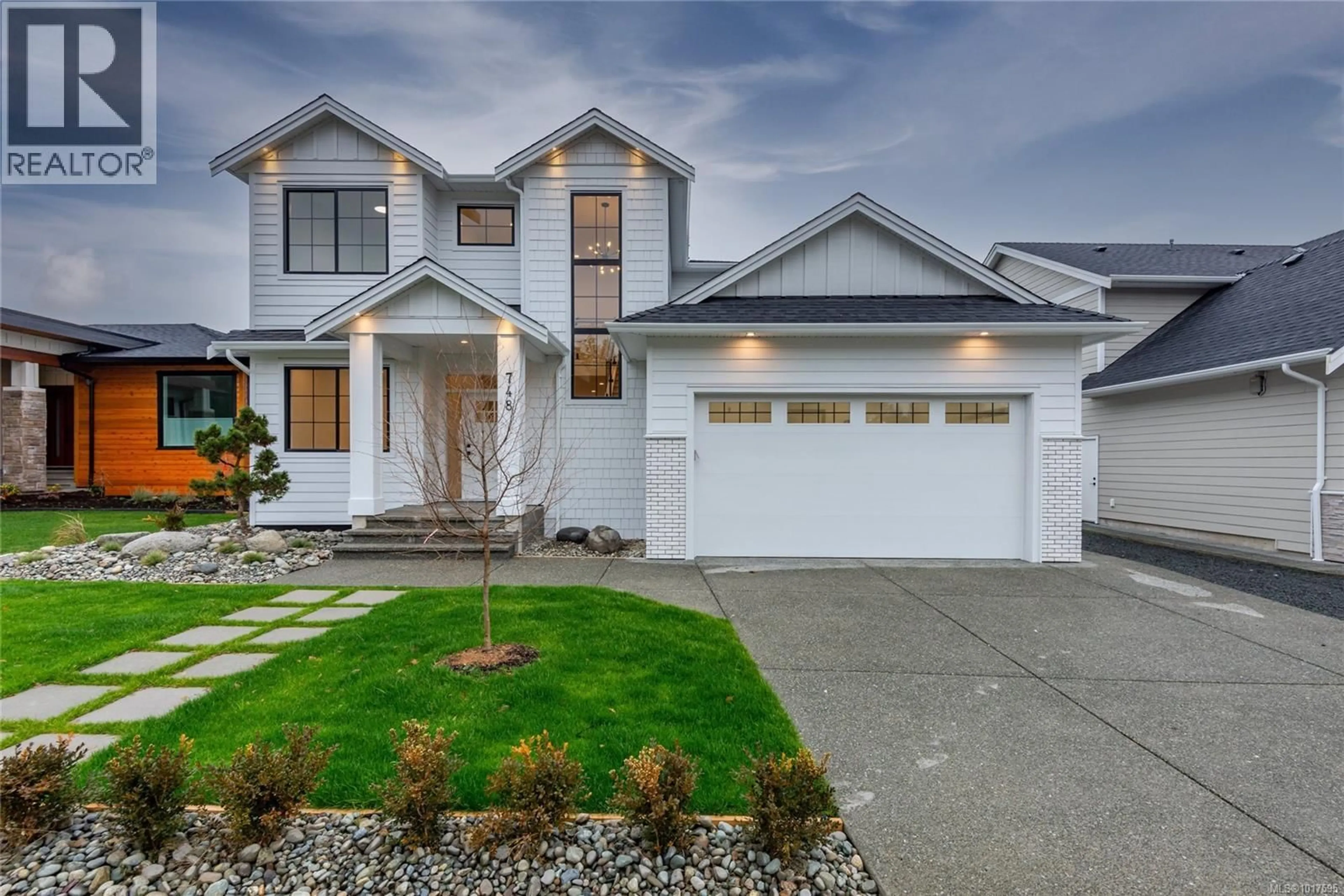 Home with vinyl exterior material, street for 748 BEAVER CREEK BOULEVARD, Campbell River British Columbia V9H0G4