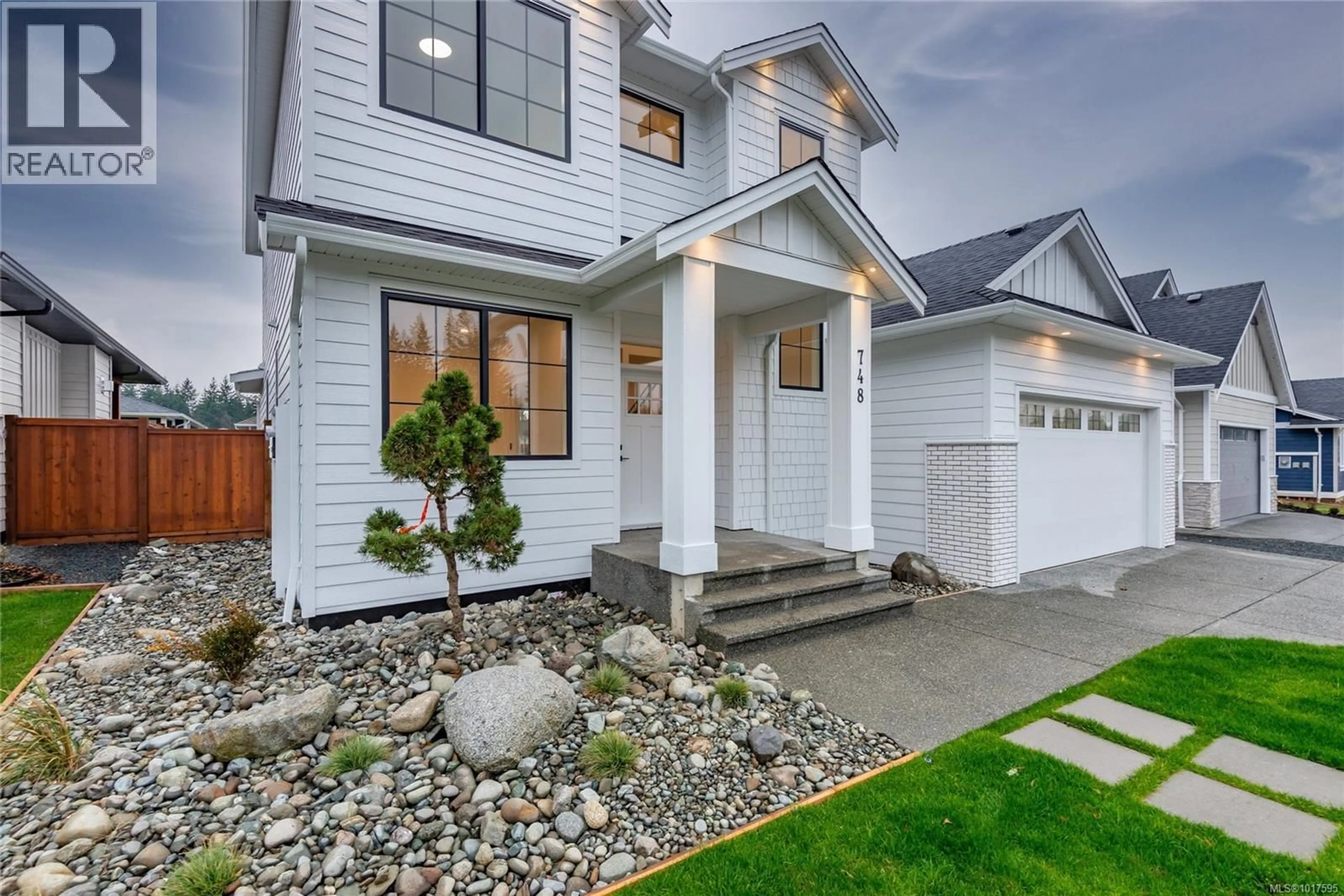 Home with vinyl exterior material, street for 748 BEAVER CREEK BOULEVARD, Campbell River British Columbia V9H0G4