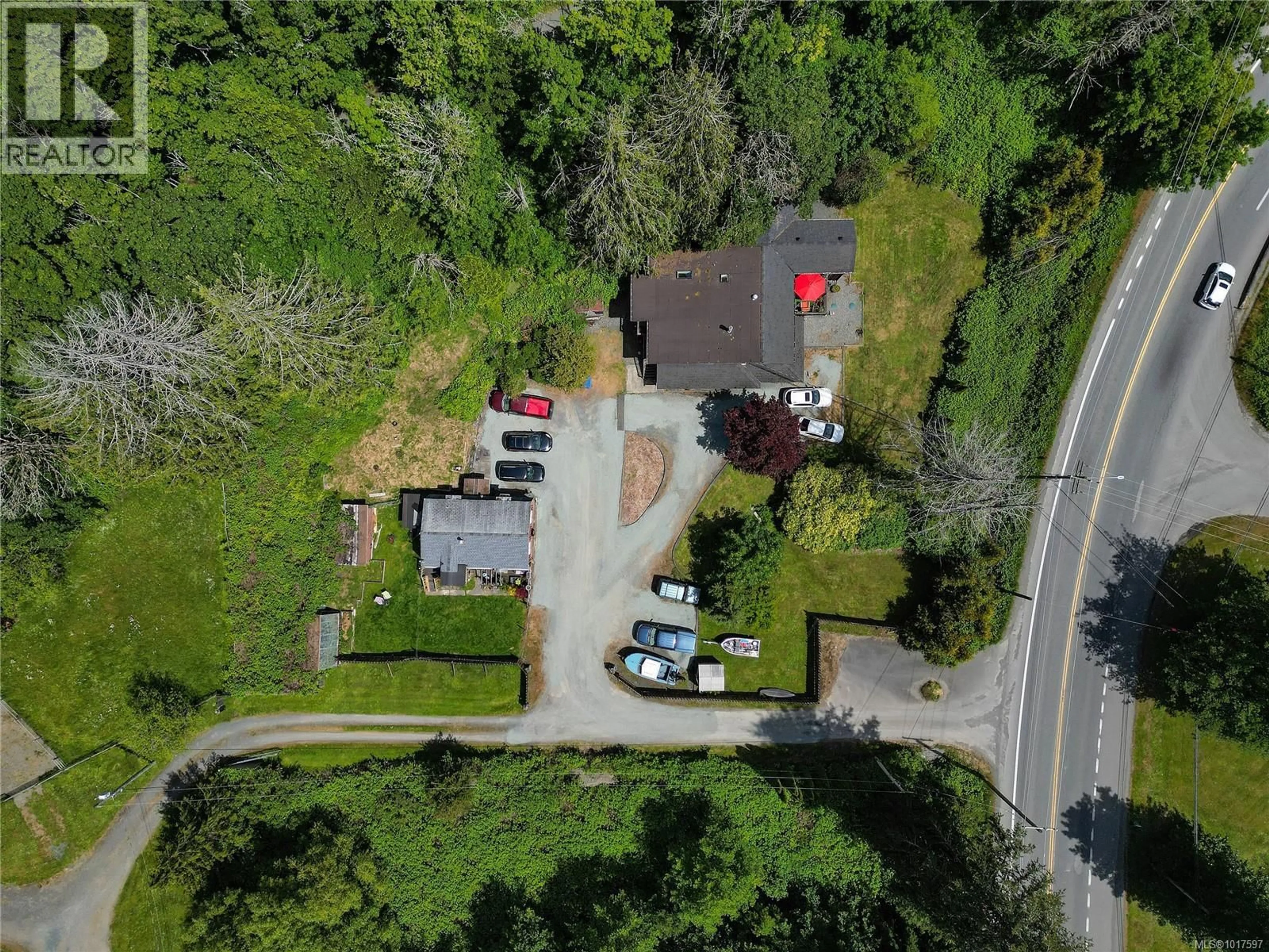 A pic from outside/outdoor area/front of a property/back of a property/a pic from drone, street for 5440 SOOKE ROAD, Sooke British Columbia V9Z0C8