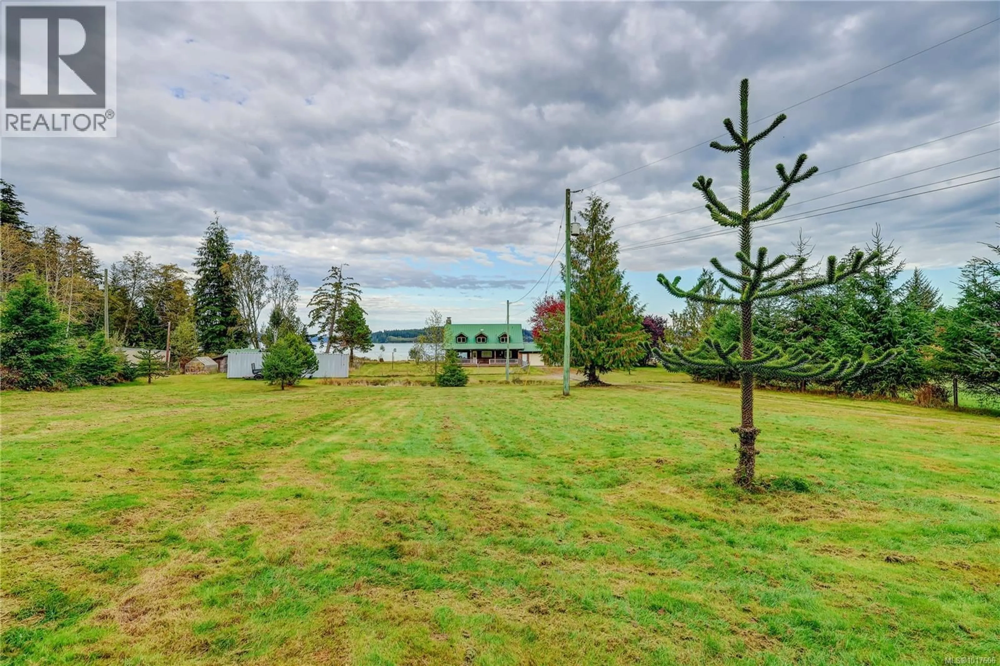 A pic from outside/outdoor area/front of a property/back of a property/a pic from drone, water/lake/river/ocean view for 6020 MINE ROAD, Port McNeill British Columbia V0N2R0
