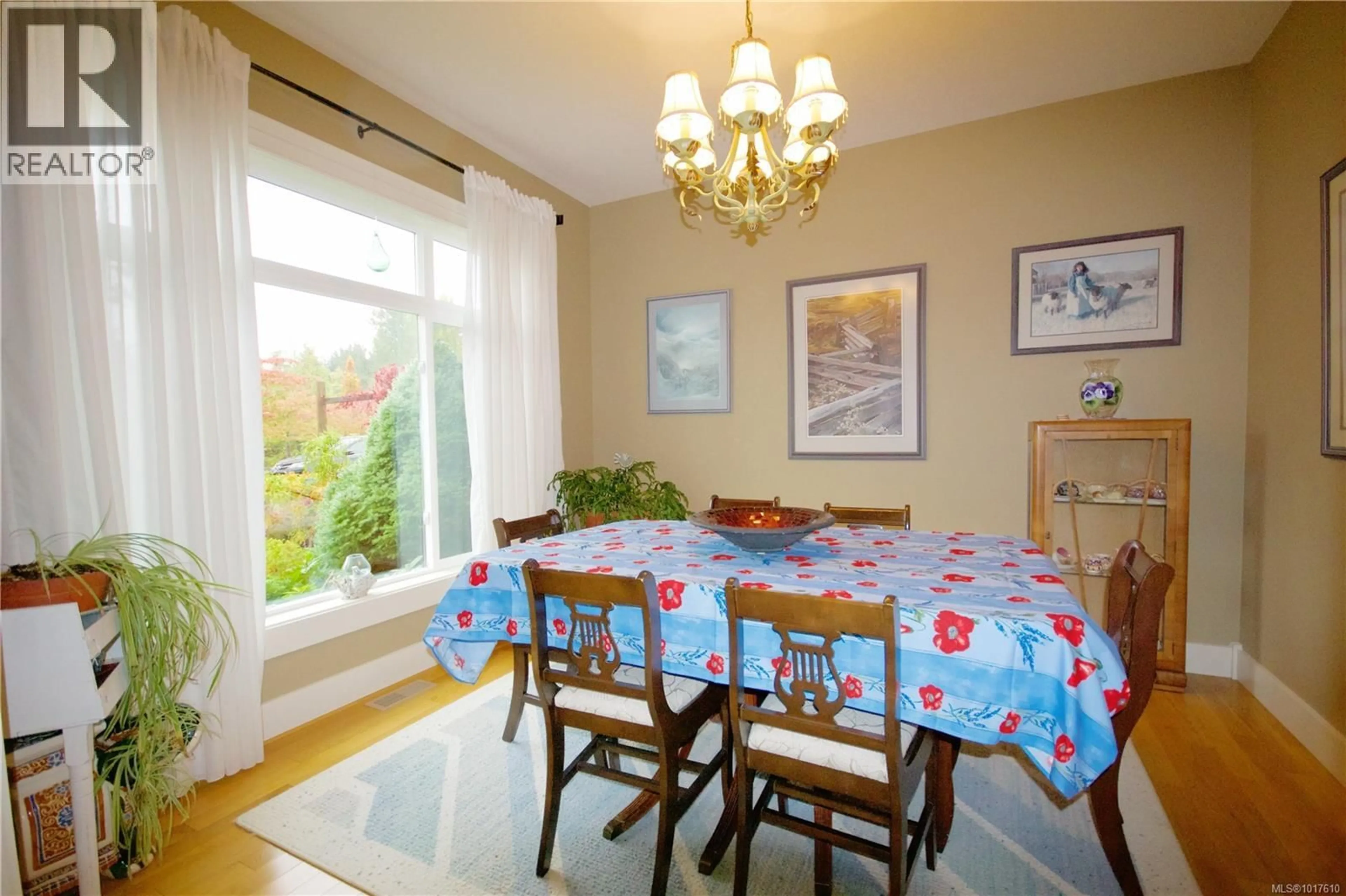 Dining room, wood/laminate floor for 2040 SUN KING ROAD, Coombs British Columbia V0R1M0
