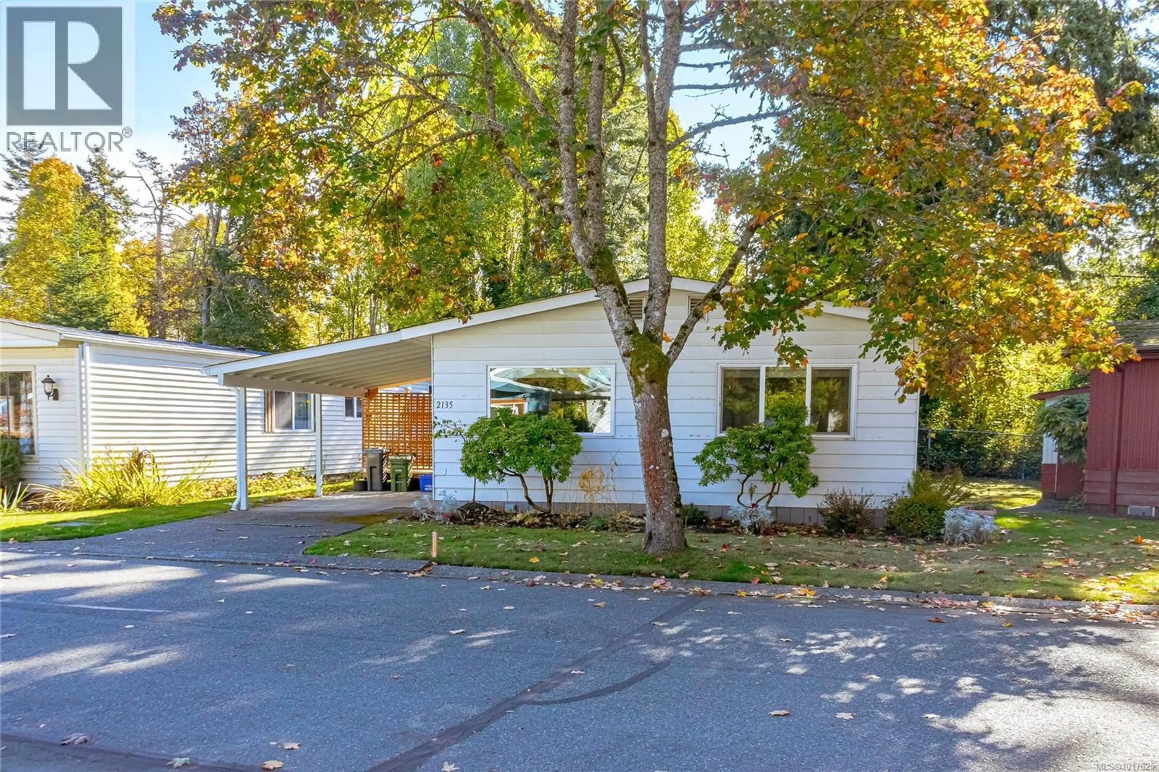 Home with vinyl exterior material, street for 2135 SUMMERGATE BOULEVARD, Sidney British Columbia V8L4K9