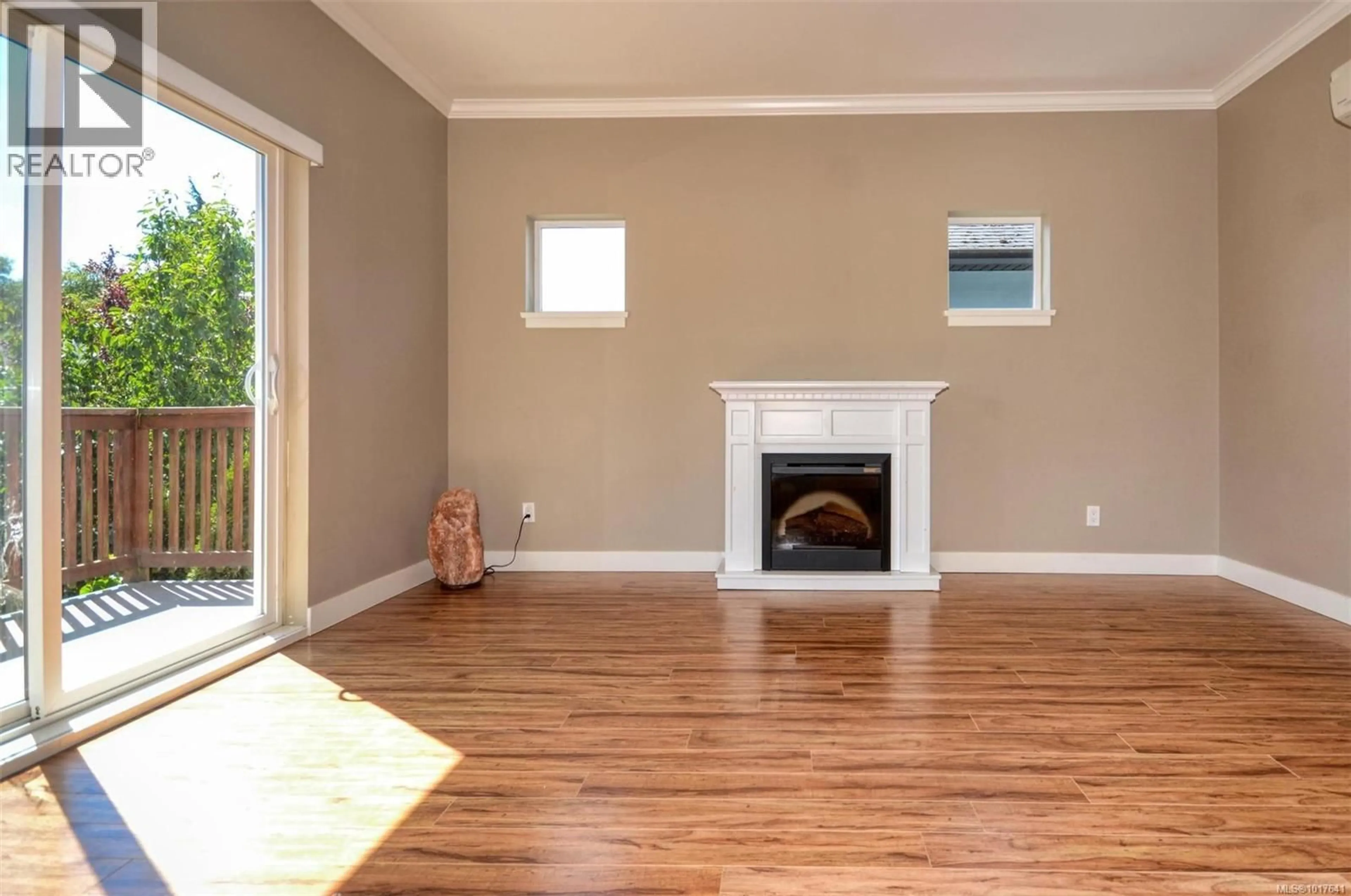 Living room with furniture, wood/laminate floor for 3307 MERLIN ROAD, Langford British Columbia V9C0H3