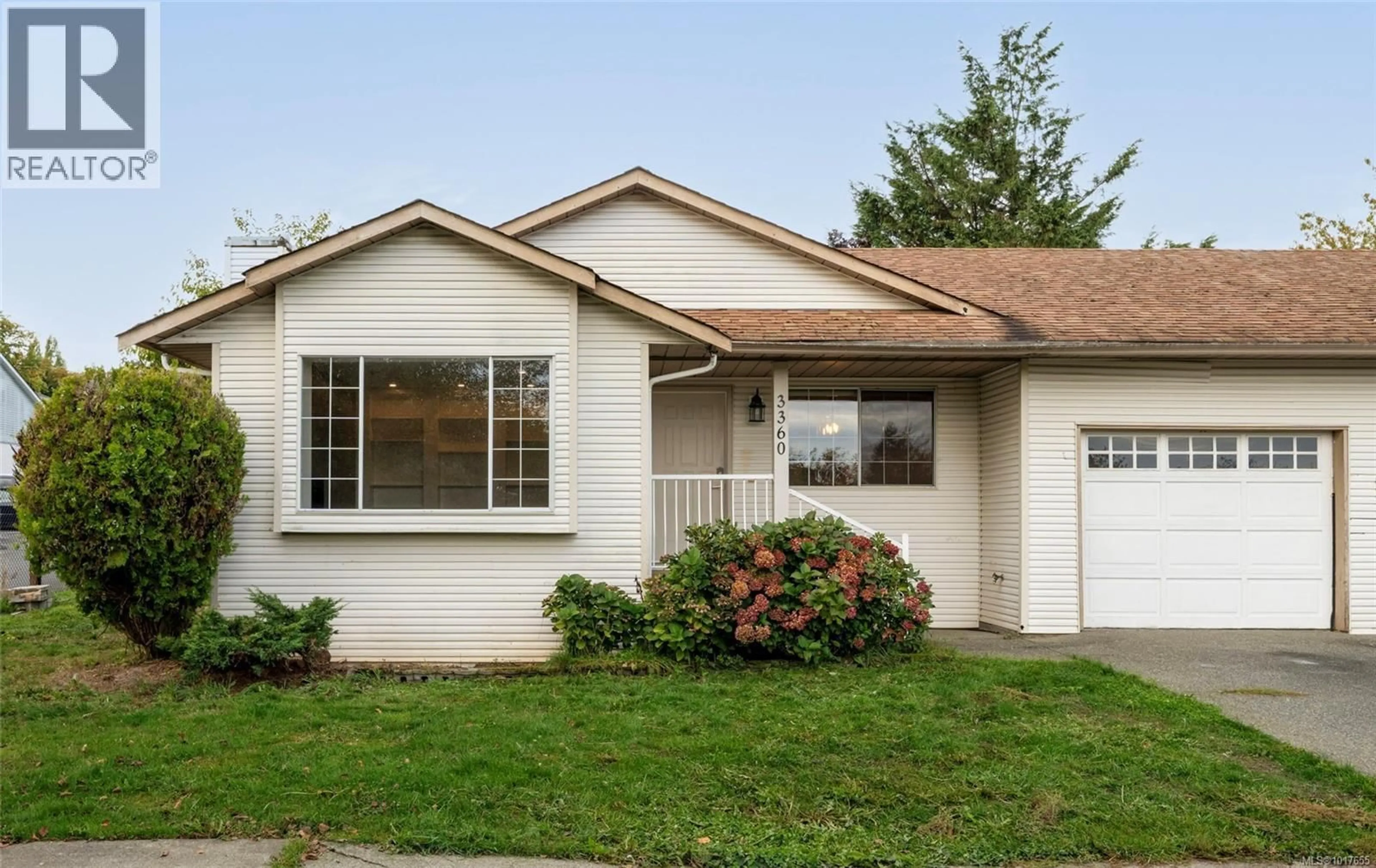 Home with vinyl exterior material, street for 3360 AUCHINACHIE ROAD, Duncan British Columbia V9L3X8