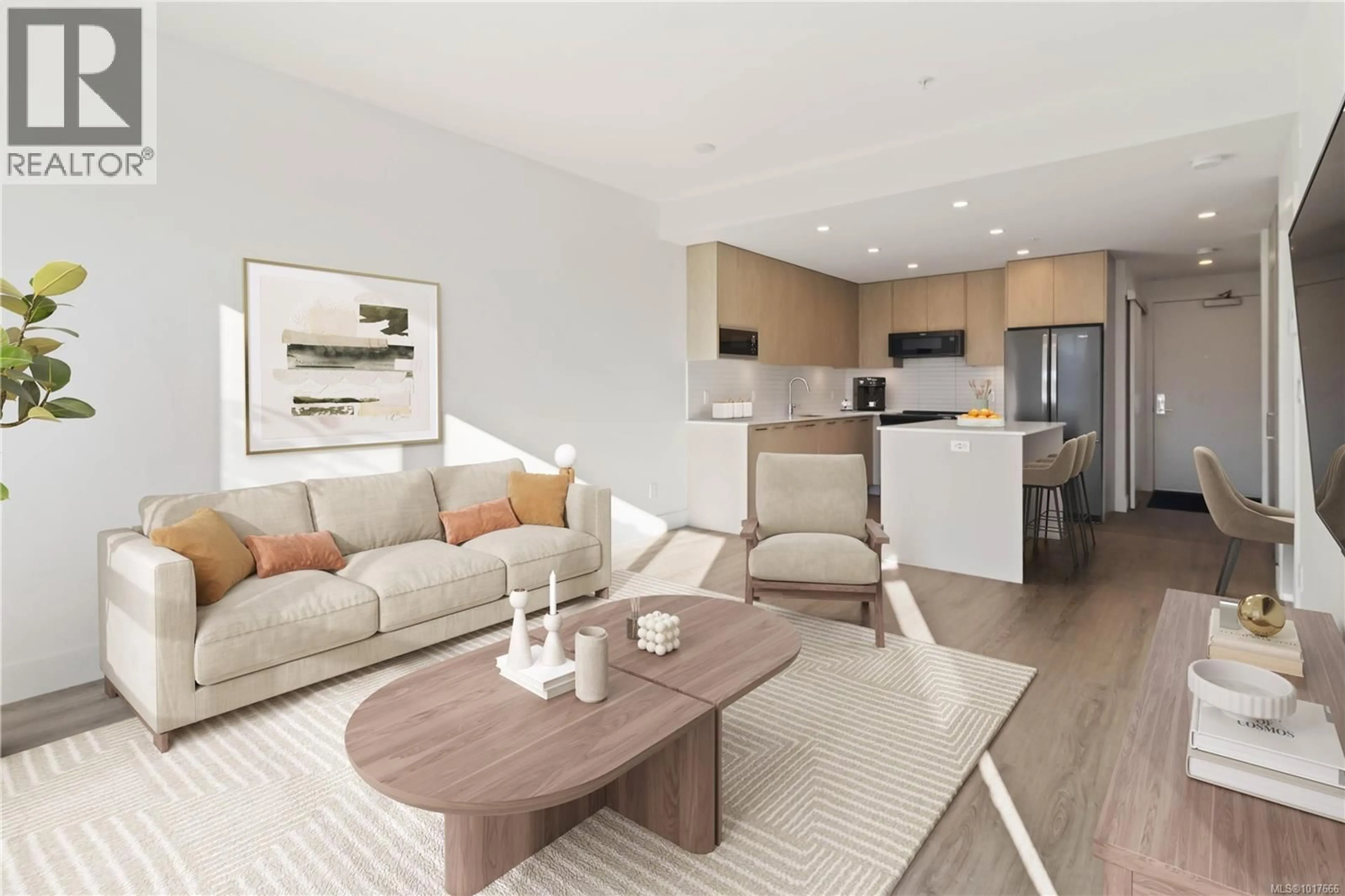 Living room with furniture, wood/laminate floor for 405 - 940 REUNION AVENUE, Langford British Columbia V9B2X5