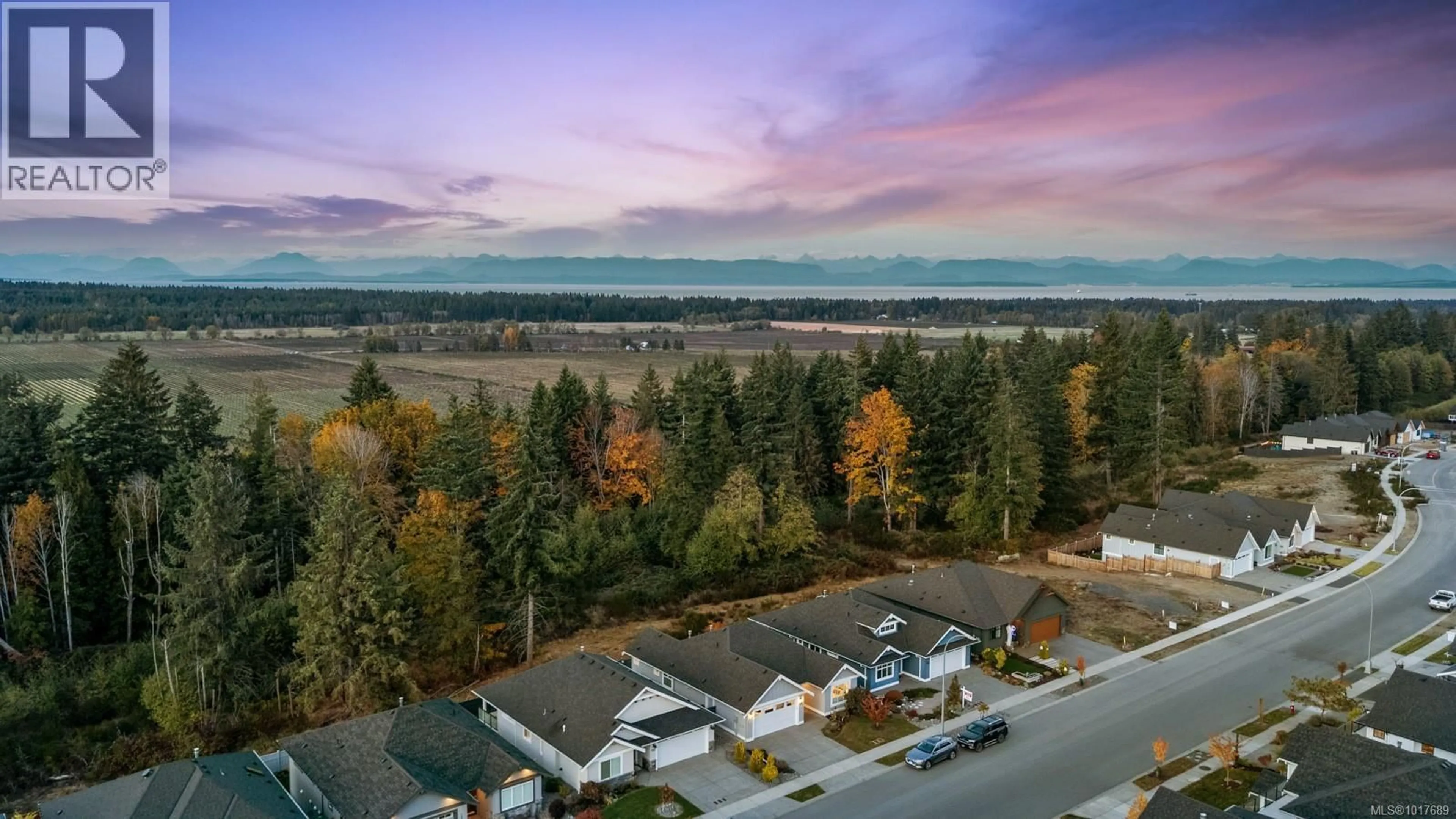 A pic from outside/outdoor area/front of a property/back of a property/a pic from drone, water/lake/river/ocean view for 1570 CROWN ISLE BOULEVARD, Courtenay British Columbia V9N0G3