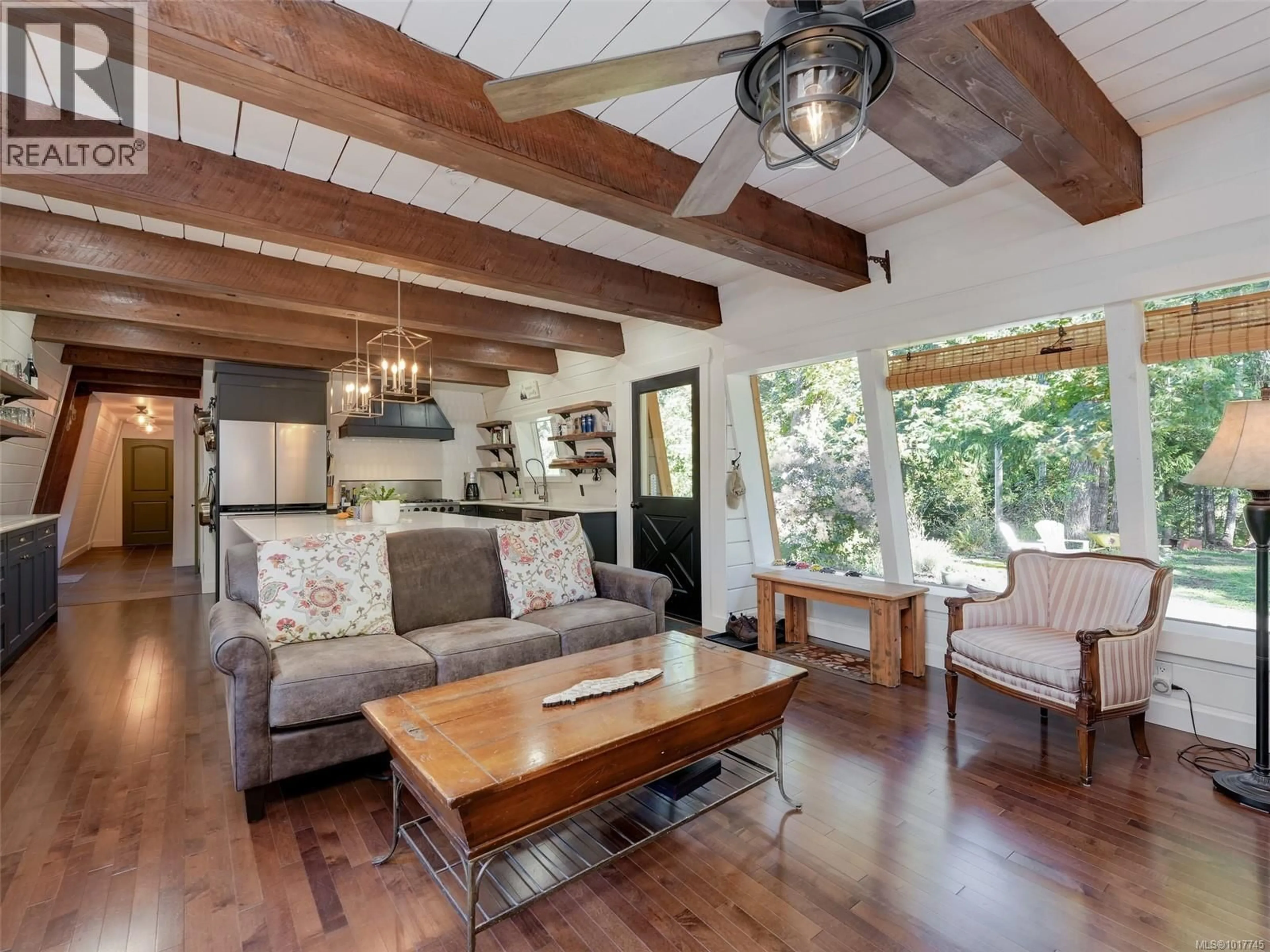 Living room with furniture, wood/laminate floor for 5530 RIVERBOTTOM ROAD, Duncan British Columbia V9L6J5