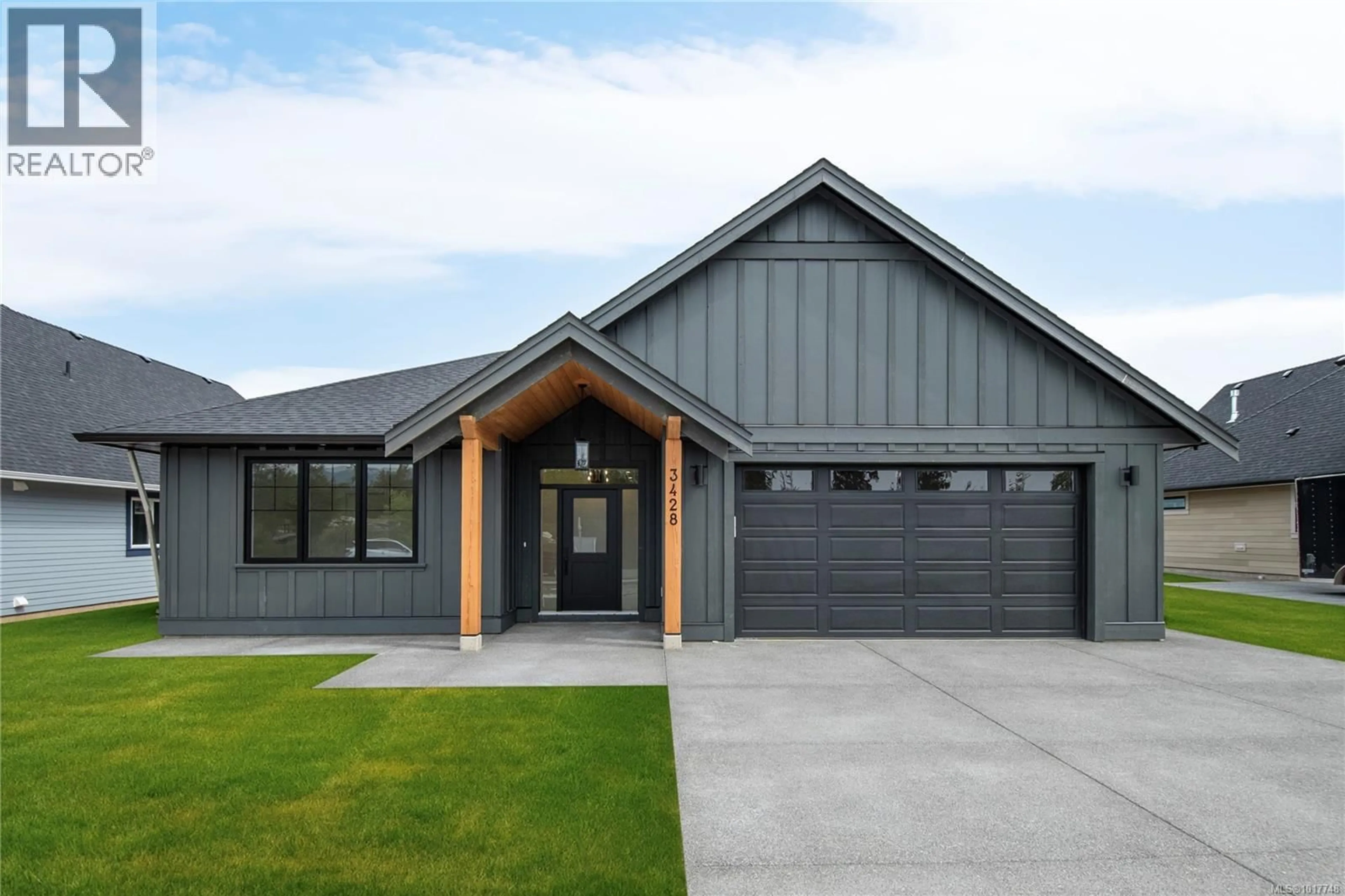 Home with vinyl exterior material, street for 3428 RHYS ROAD, Courtenay British Columbia V9N7G3