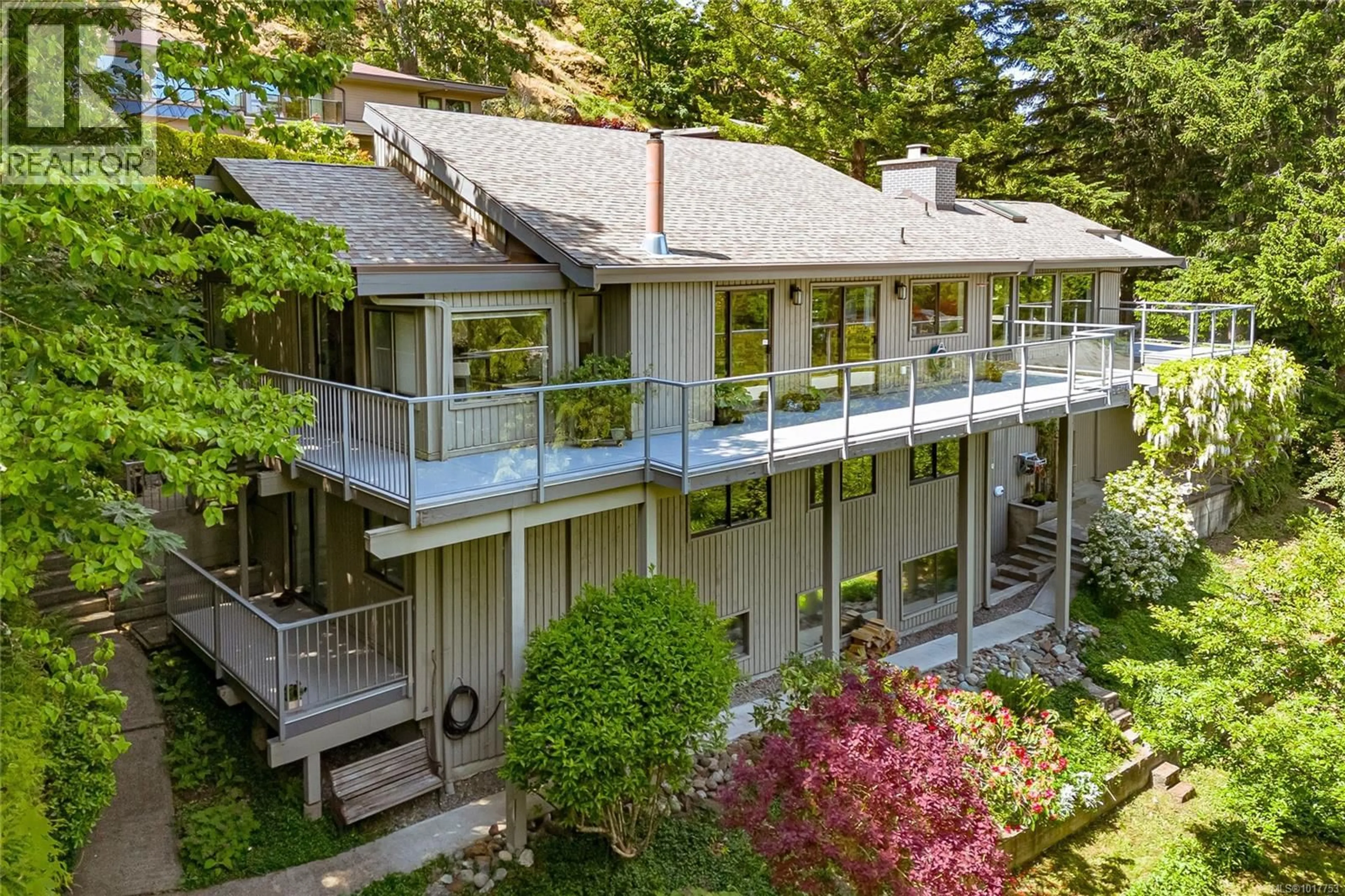 A pic from outside/outdoor area/front of a property/back of a property/a pic from drone, unknown for 4689 BOULDERWOOD DRIVE, Saanich British Columbia V8Y2P8