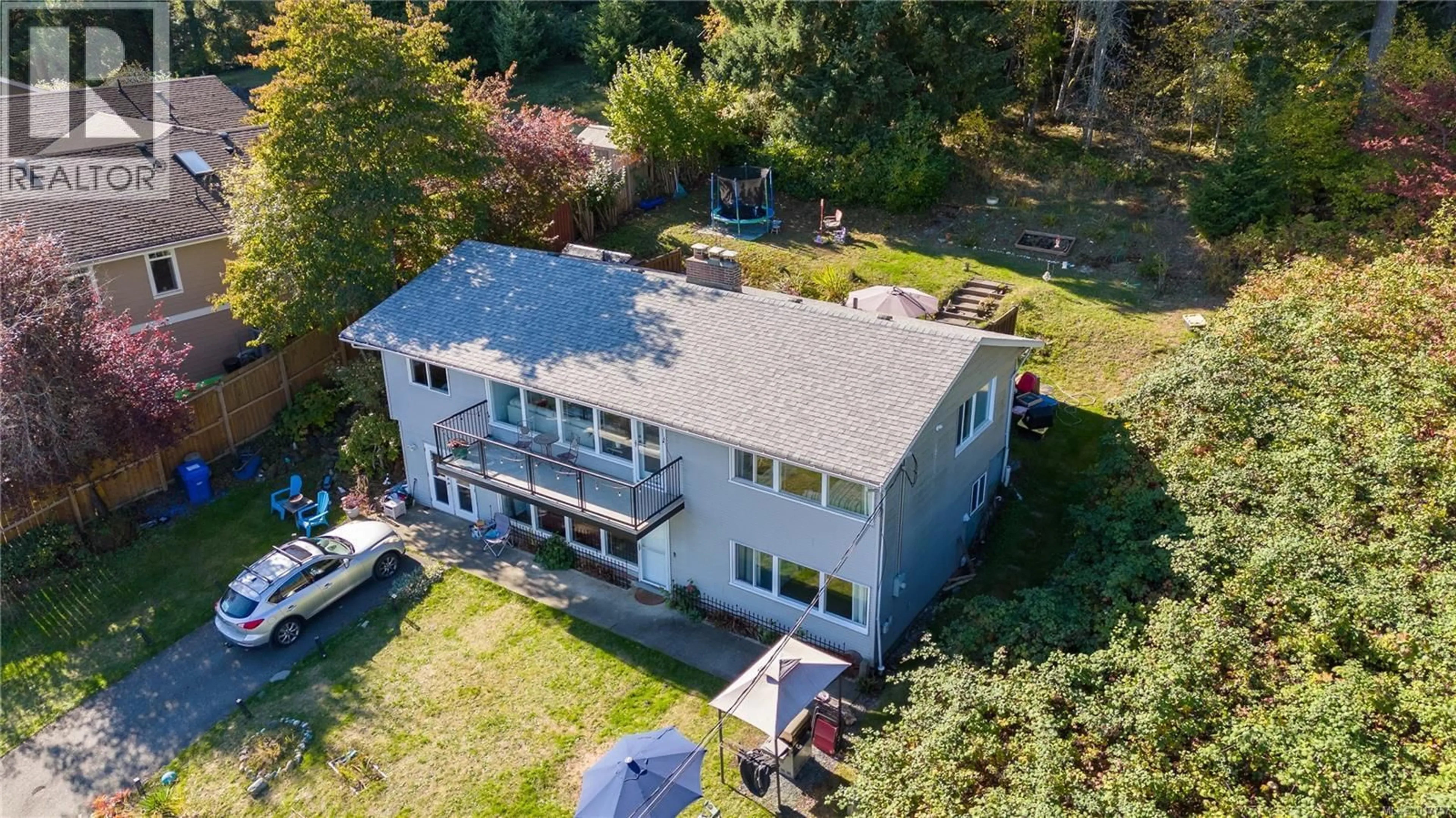 A pic from outside/outdoor area/front of a property/back of a property/a pic from drone, water/lake/river/ocean view for 713 DOGWOOD ROAD, Nanaimo British Columbia V9R3C2