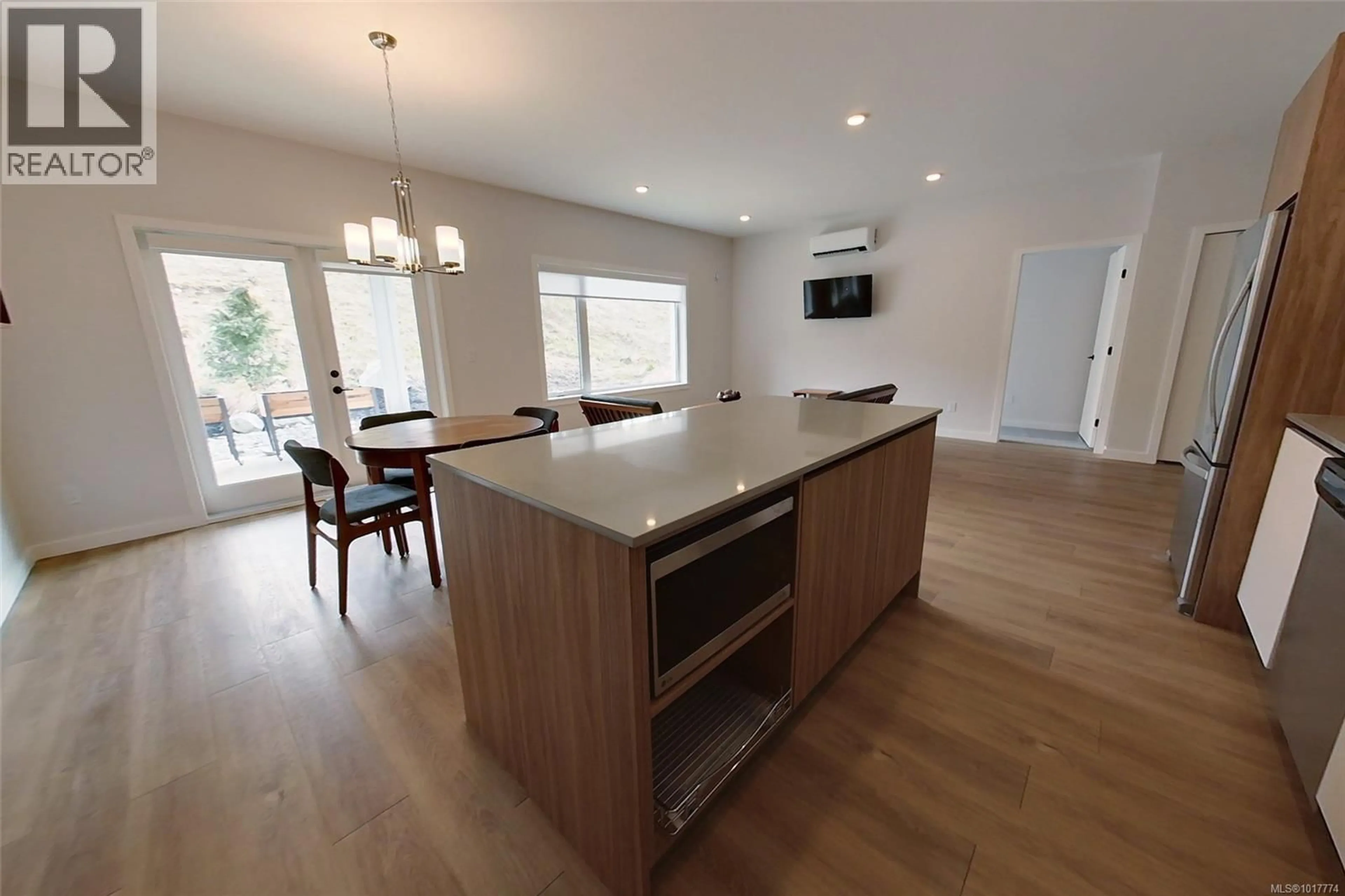 Open concept kitchen, wood/laminate floor for 103-B - 3590 16TH AVENUE, Port Alberni British Columbia V9Y7L9