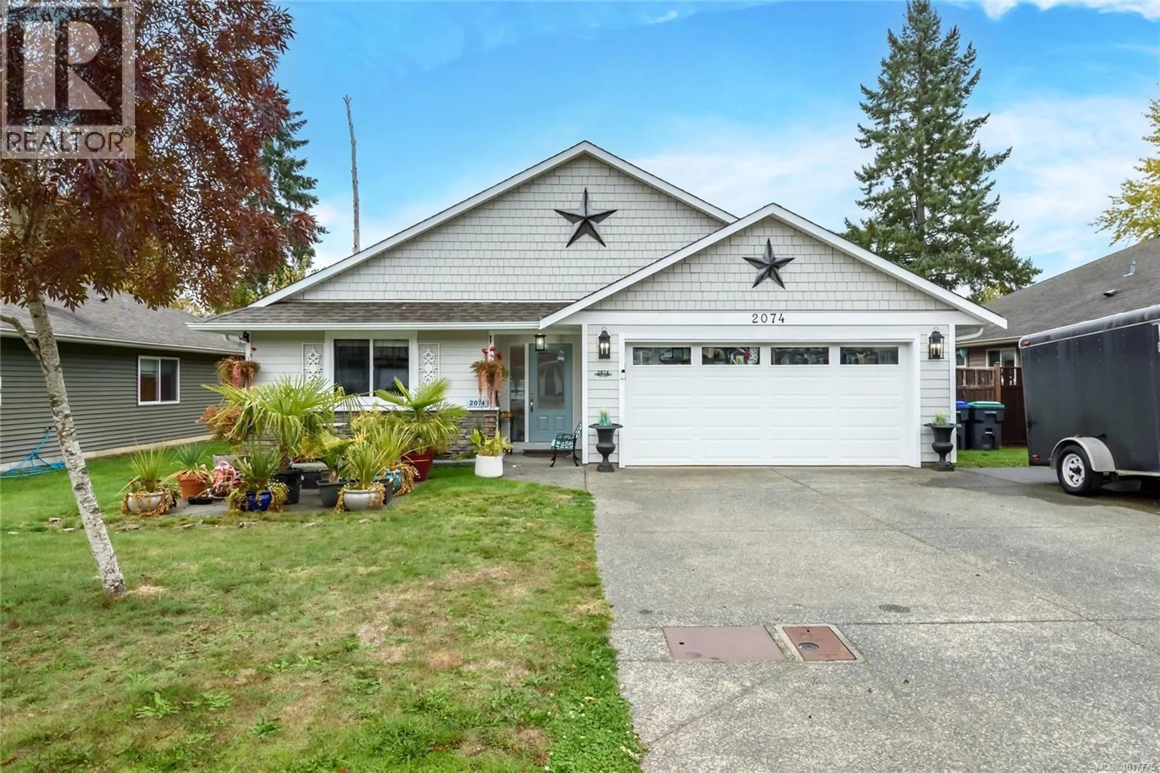 Home with vinyl exterior material, street for 2074 LAMBERT DRIVE, Courtenay British Columbia V9N9C9