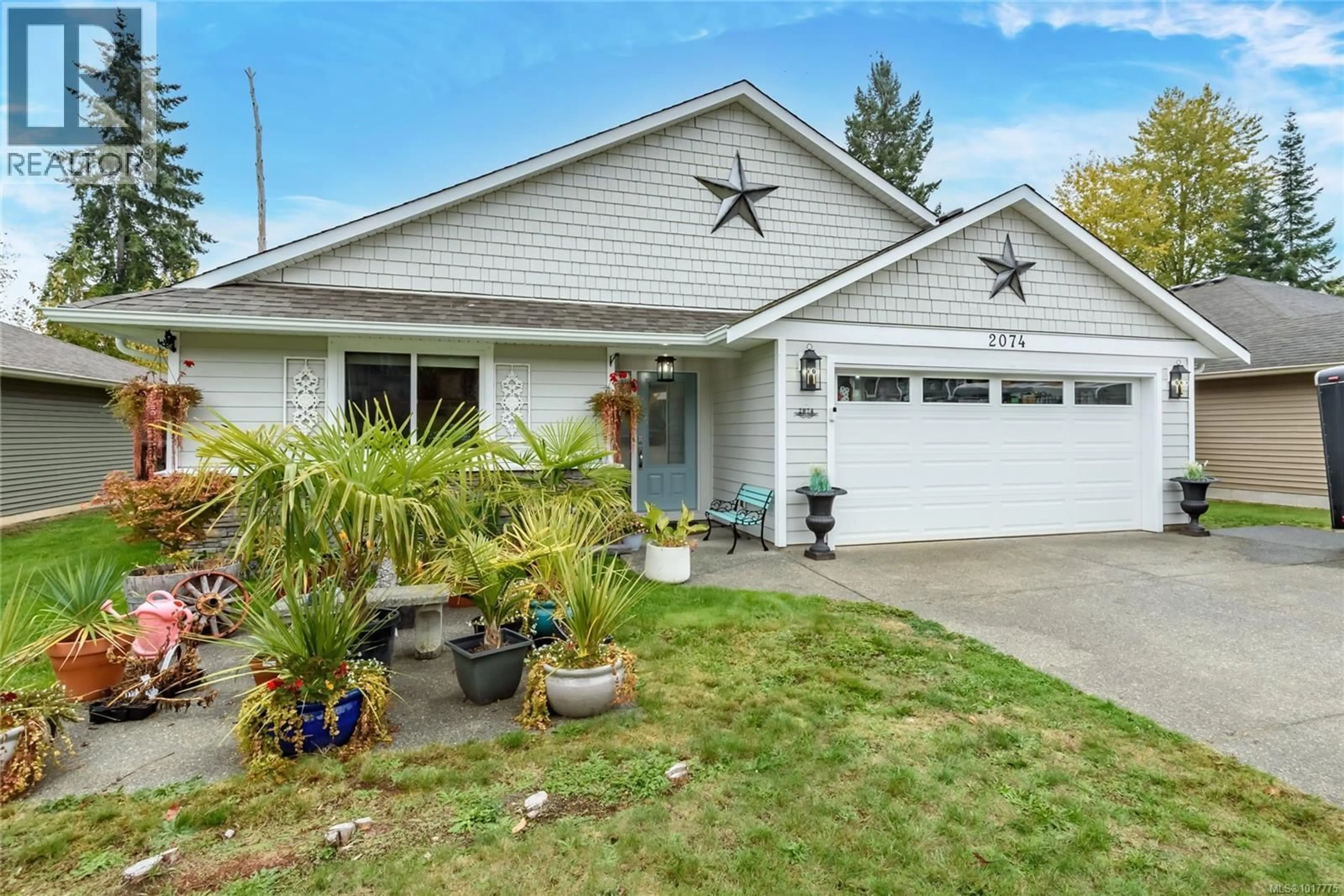 Home with vinyl exterior material, street for 2074 LAMBERT DRIVE, Courtenay British Columbia V9N9C9