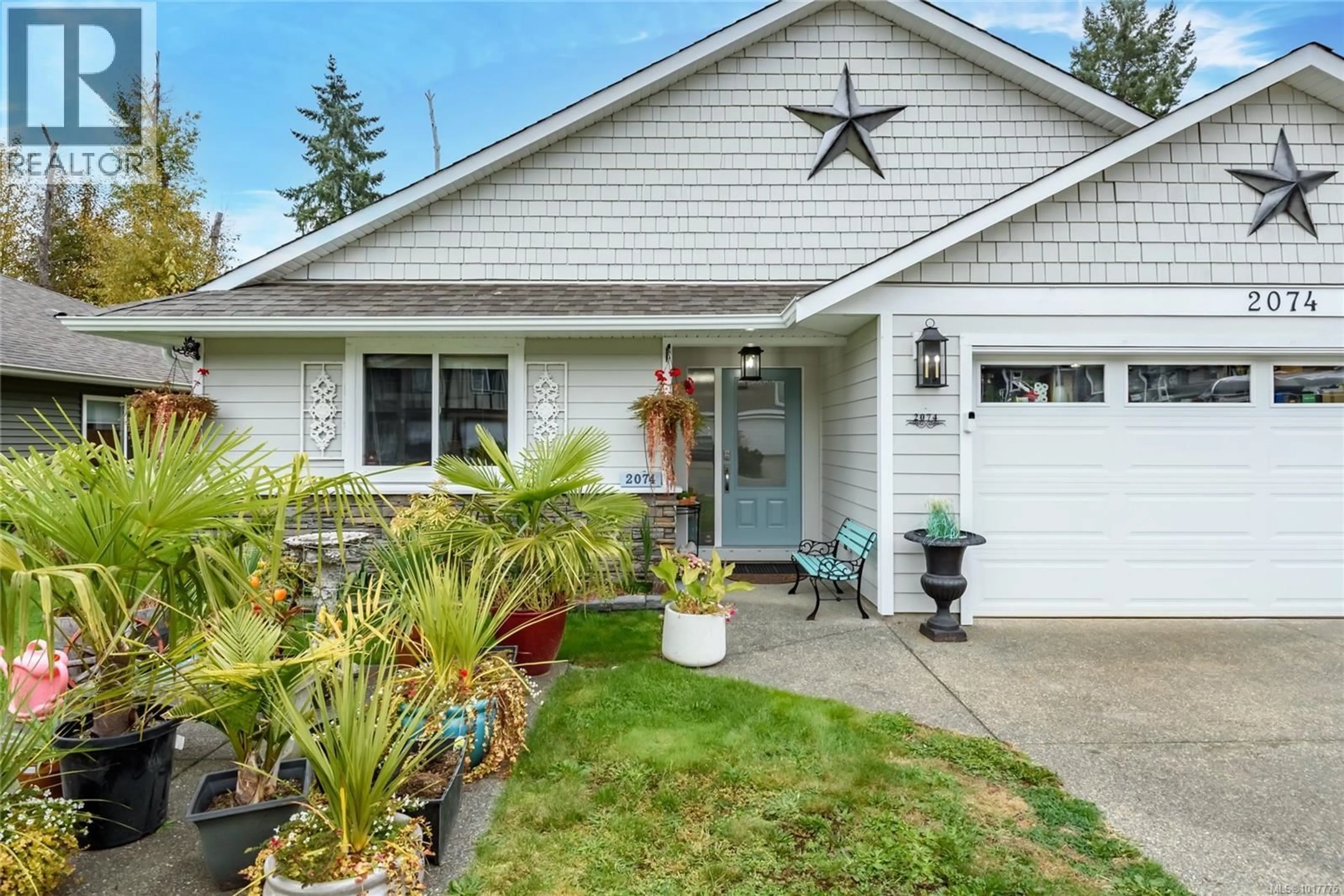 Home with vinyl exterior material, street for 2074 LAMBERT DRIVE, Courtenay British Columbia V9N9C9