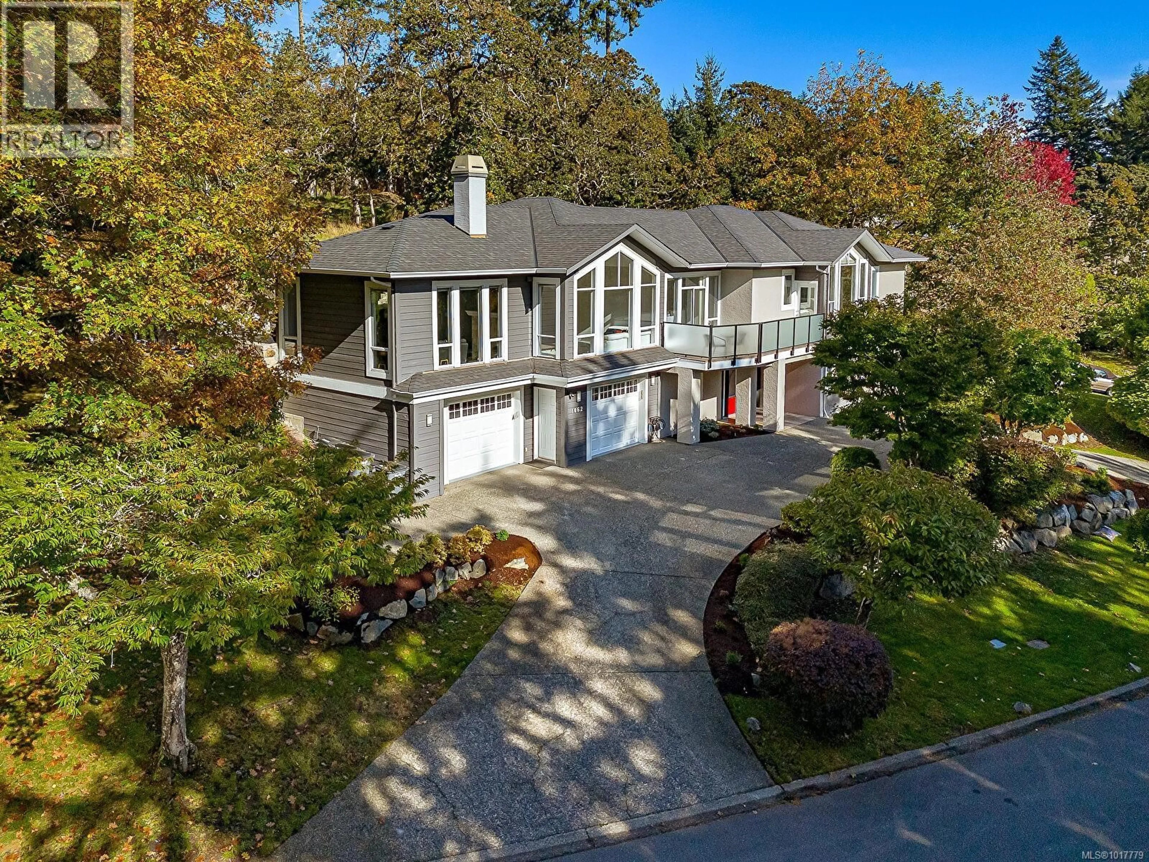 A pic from outside/outdoor area/front of a property/back of a property/a pic from drone, unknown for 1062 VALEWOOD TRAIL, Saanich British Columbia V8X5G7