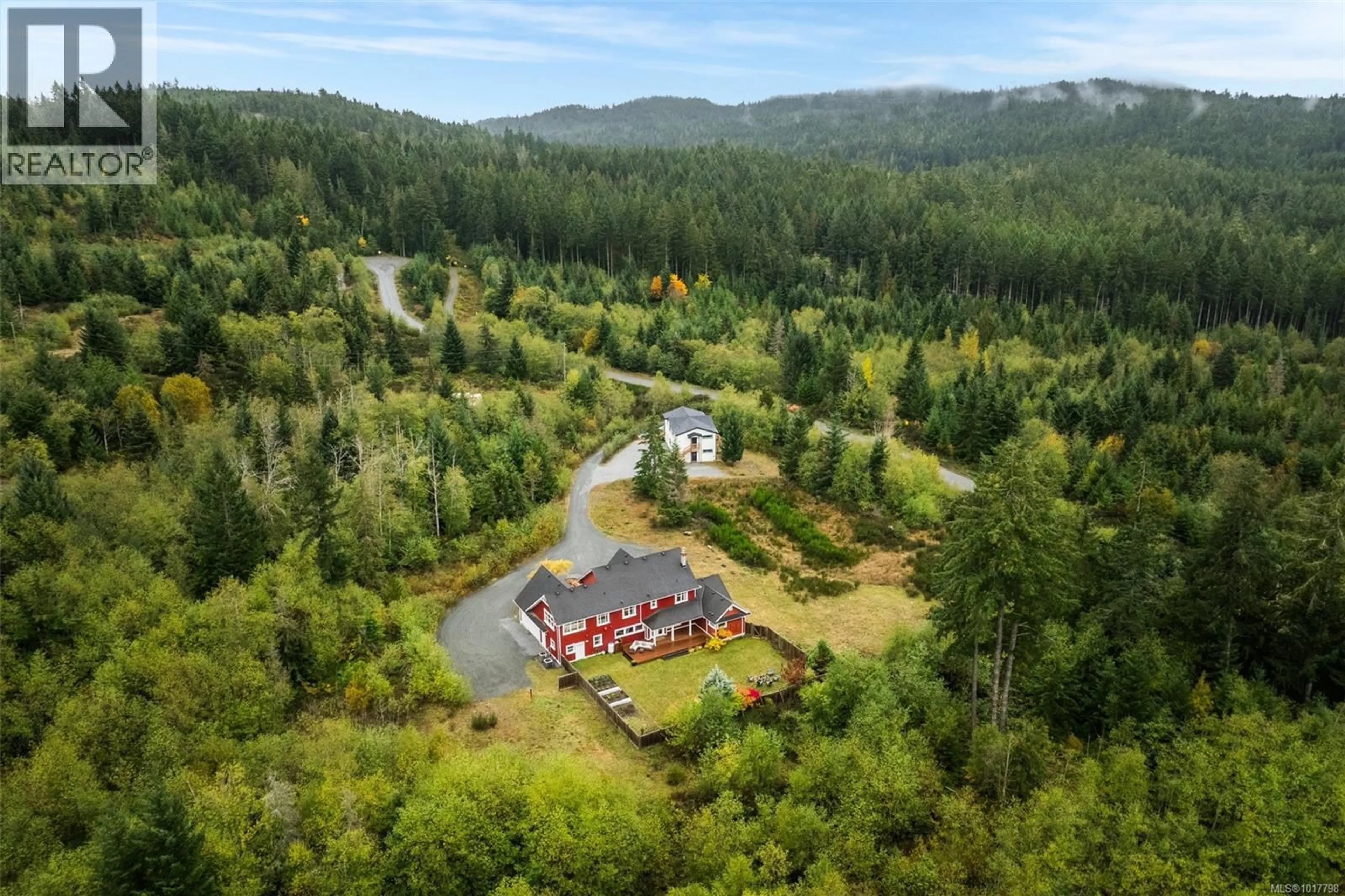 A pic from outside/outdoor area/front of a property/back of a property/a pic from drone, forest/trees view for 319 STEBBINGS ROAD, Shawnigan Lake British Columbia V0R2L0