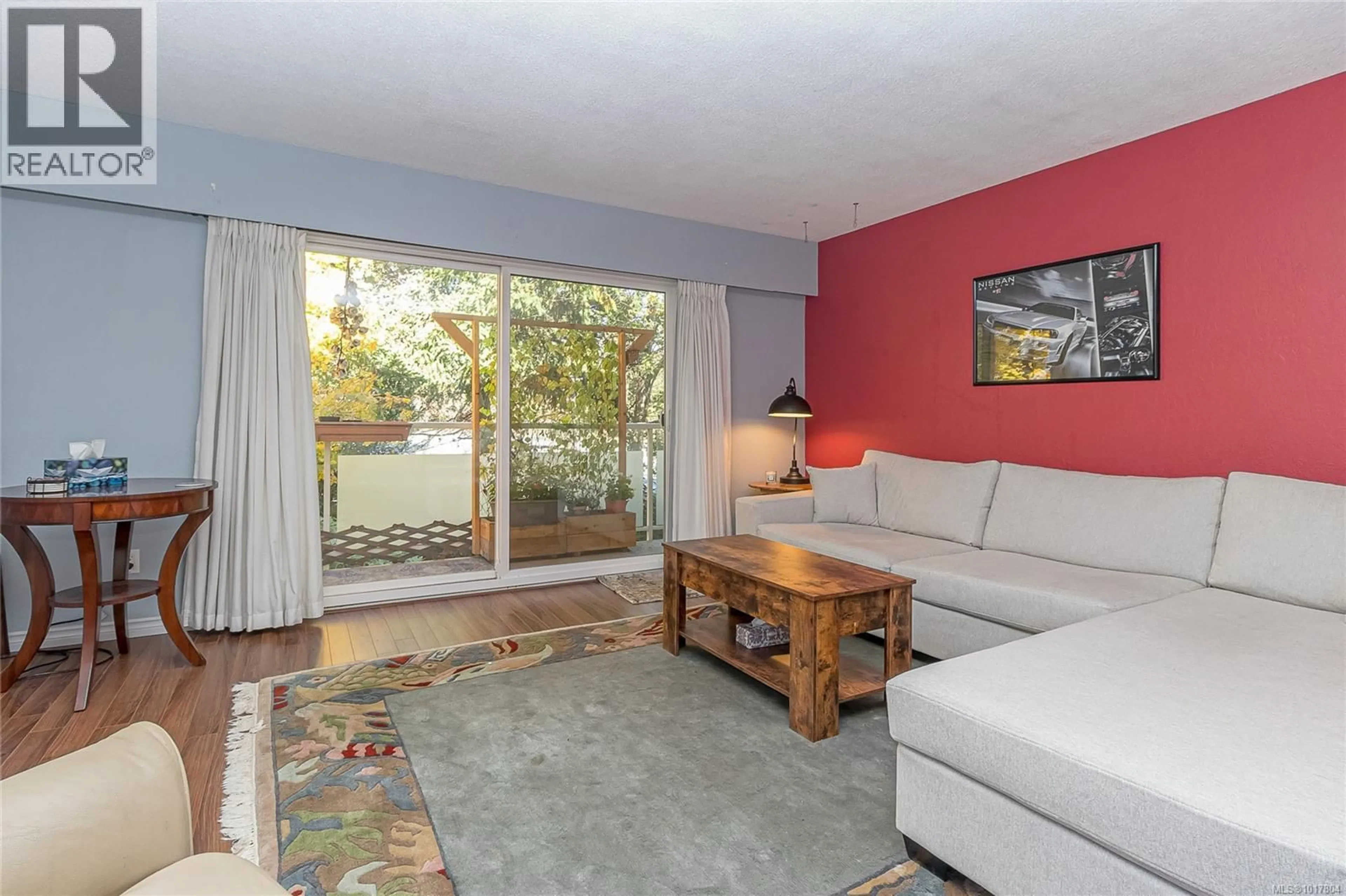 Living room with furniture, unknown for 310 - 1490 GARNET ROAD, Saanich British Columbia V8P5L1