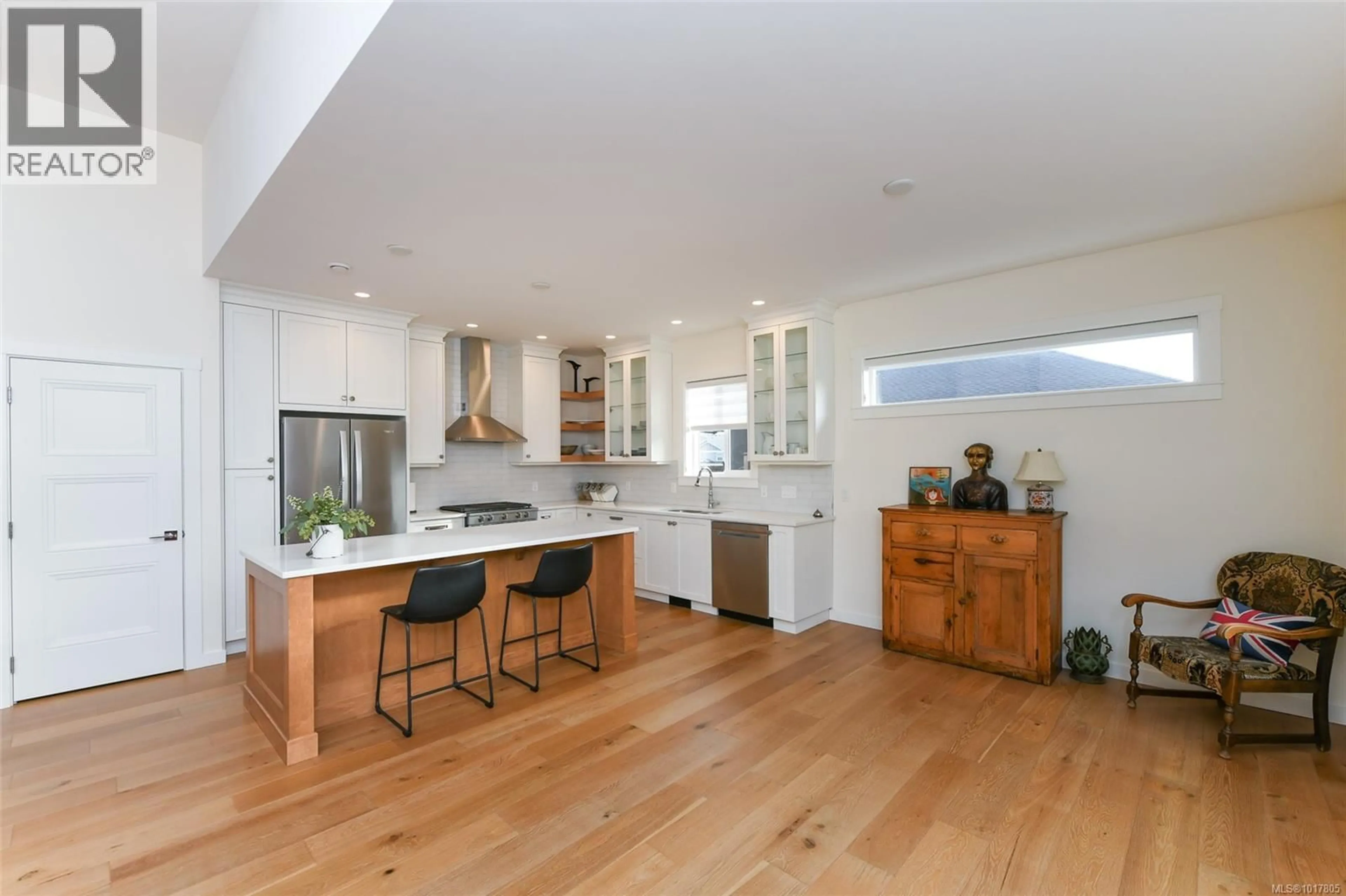 Open concept kitchen, wood/laminate floor for 3409 MARYGROVE DRIVE, Courtenay British Columbia V9N0E7