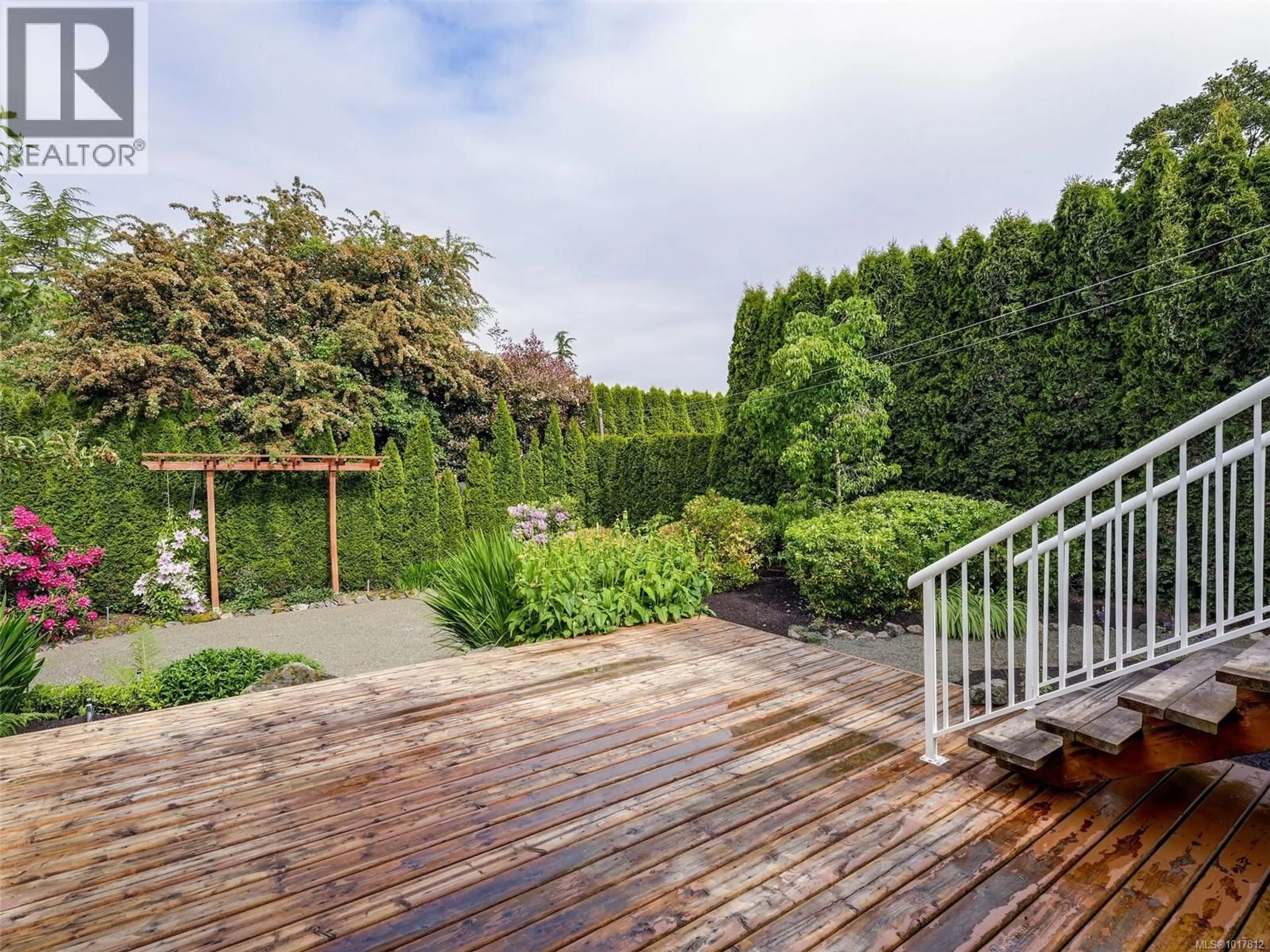 Patio, forest/trees view for 4406 TORQUAY DRIVE, Saanich British Columbia V8N3L4