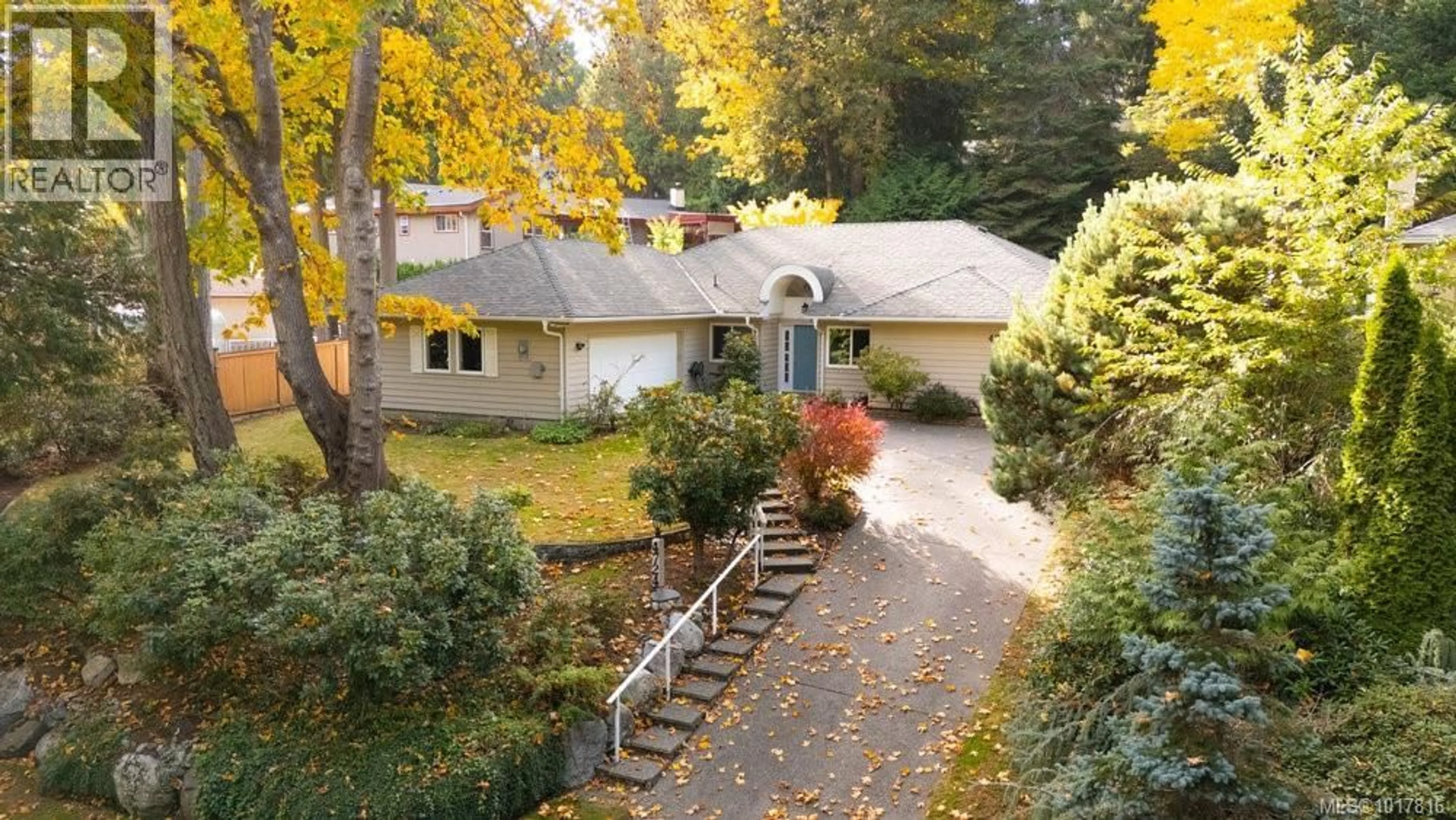 A pic from outside/outdoor area/front of a property/back of a property/a pic from drone, street for 4724 LOCHSIDE DRIVE, Saanich British Columbia V8Y3B6