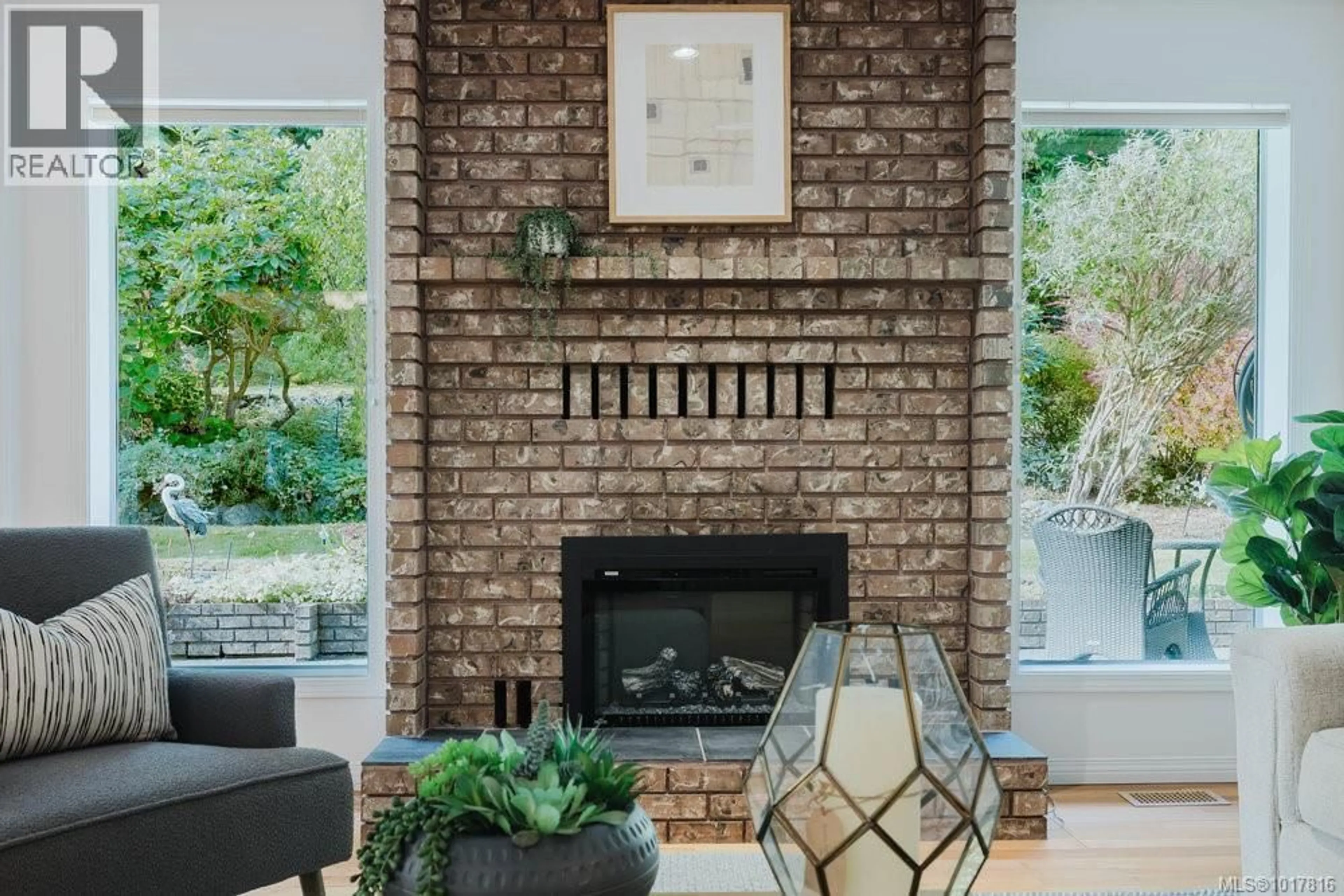 Home with brick exterior material, unknown for 4724 LOCHSIDE DRIVE, Saanich British Columbia V8Y3B6