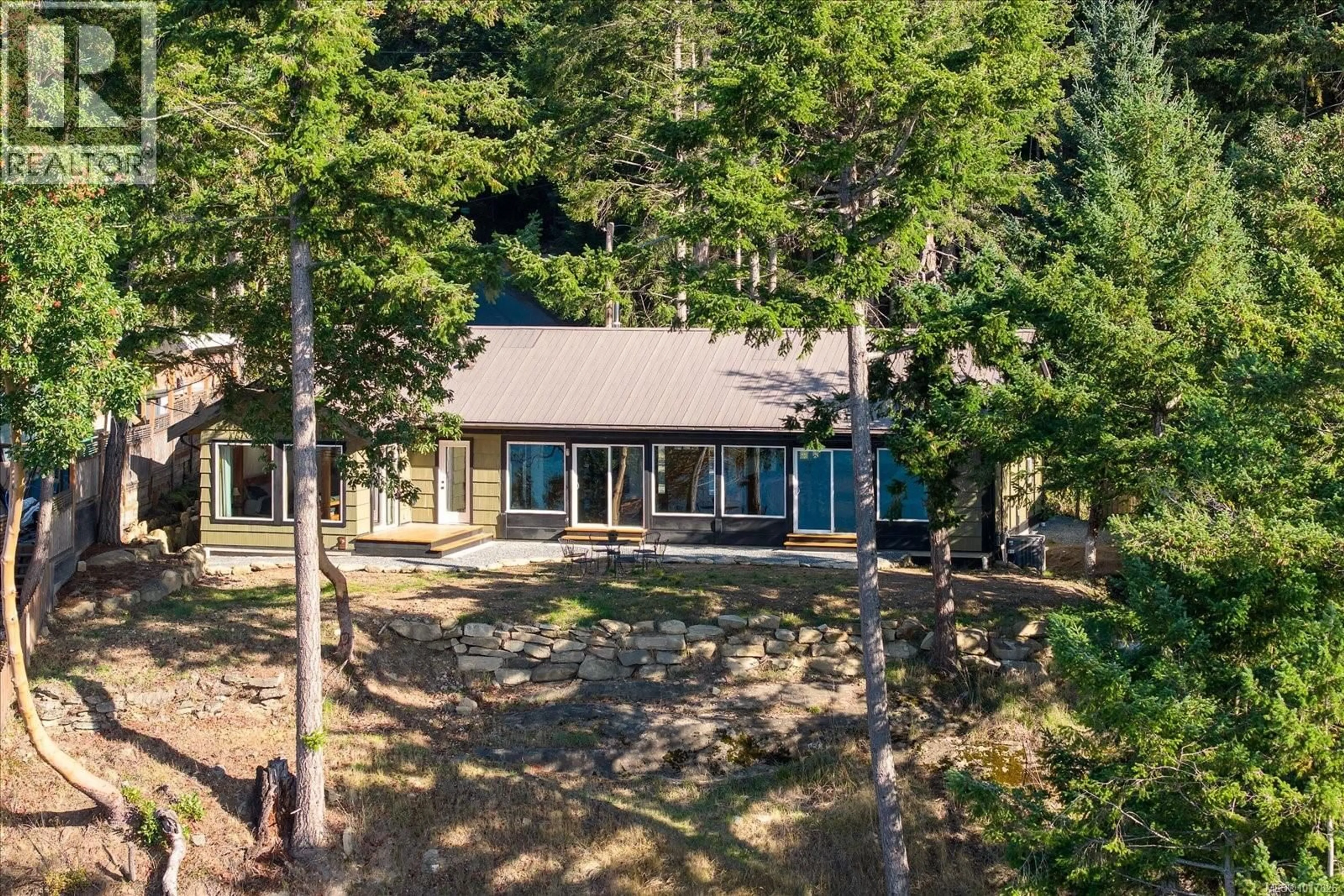 A pic from outside/outdoor area/front of a property/back of a property/a pic from drone, forest/trees view for 1306 HARRISON WAY, Gabriola Island British Columbia V0R1X2