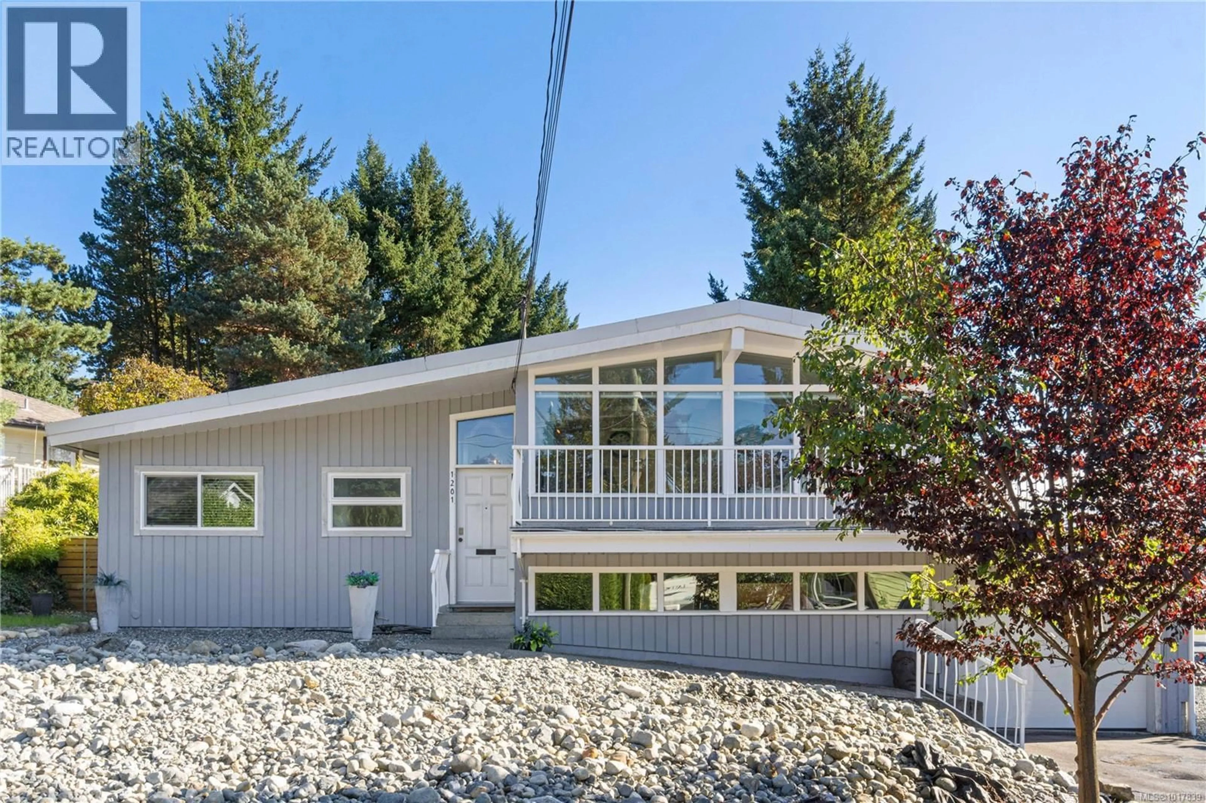 Home with vinyl exterior material, mountain view for 1201 THUNDERBIRD DRIVE, Nanaimo British Columbia V9S2P4