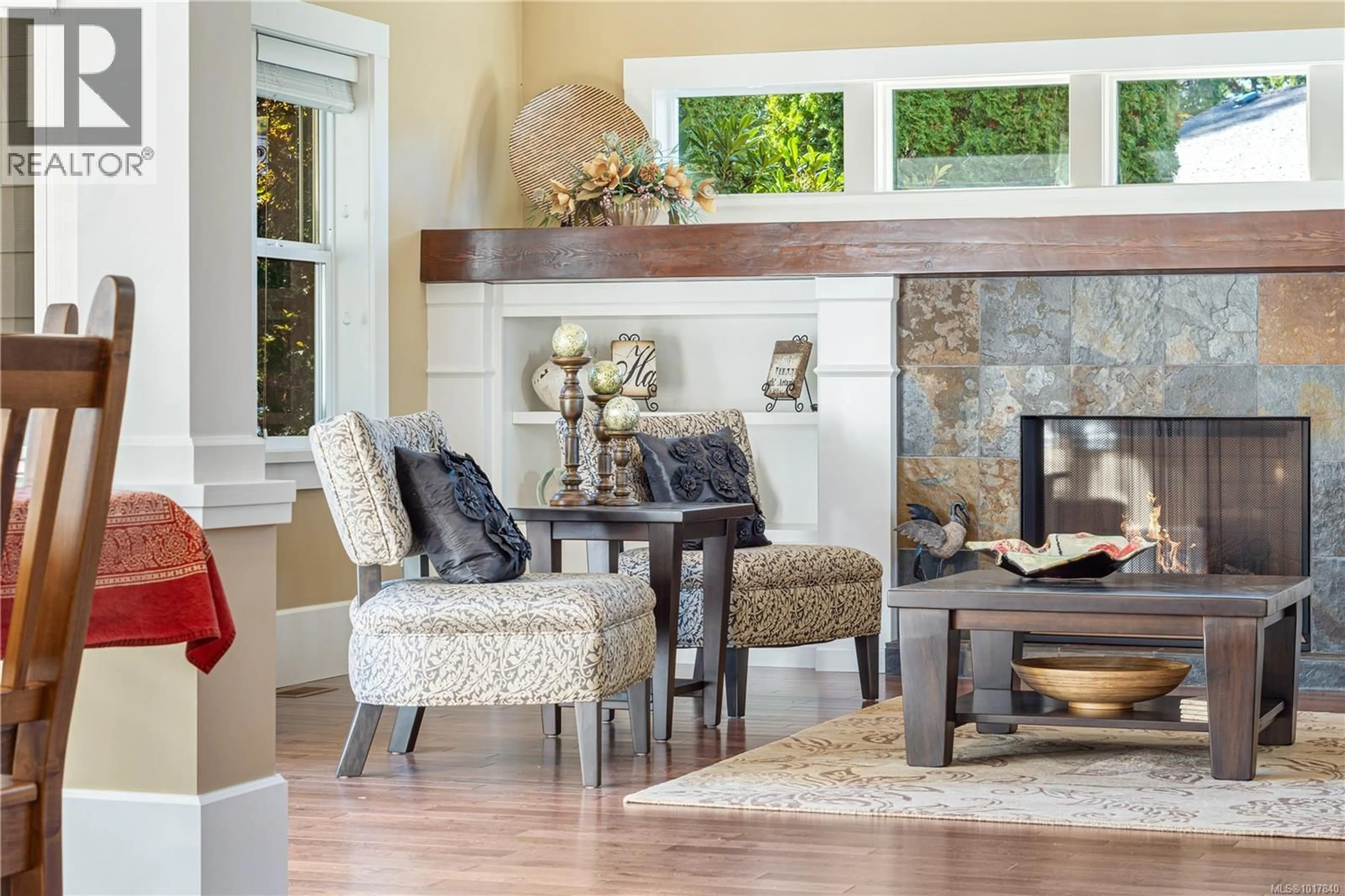 Living room with furniture, wood/laminate floor for 689 ABERNATHY PLACE, Parksville British Columbia V9P2Y9