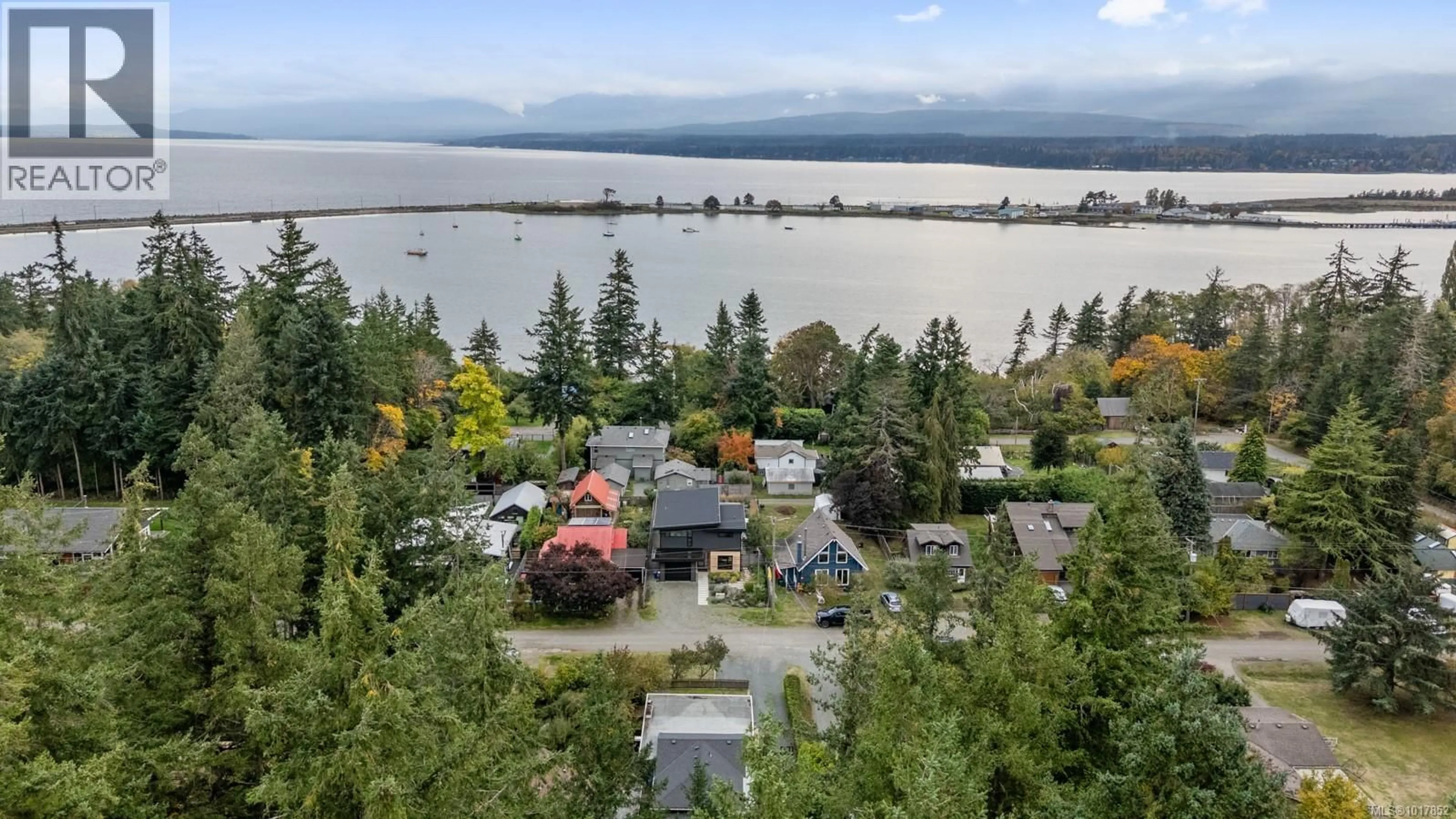 A pic from outside/outdoor area/front of a property/back of a property/a pic from drone, water/lake/river/ocean view for 1314 DOCLIDDLE ROAD, Comox British Columbia V9M2P9