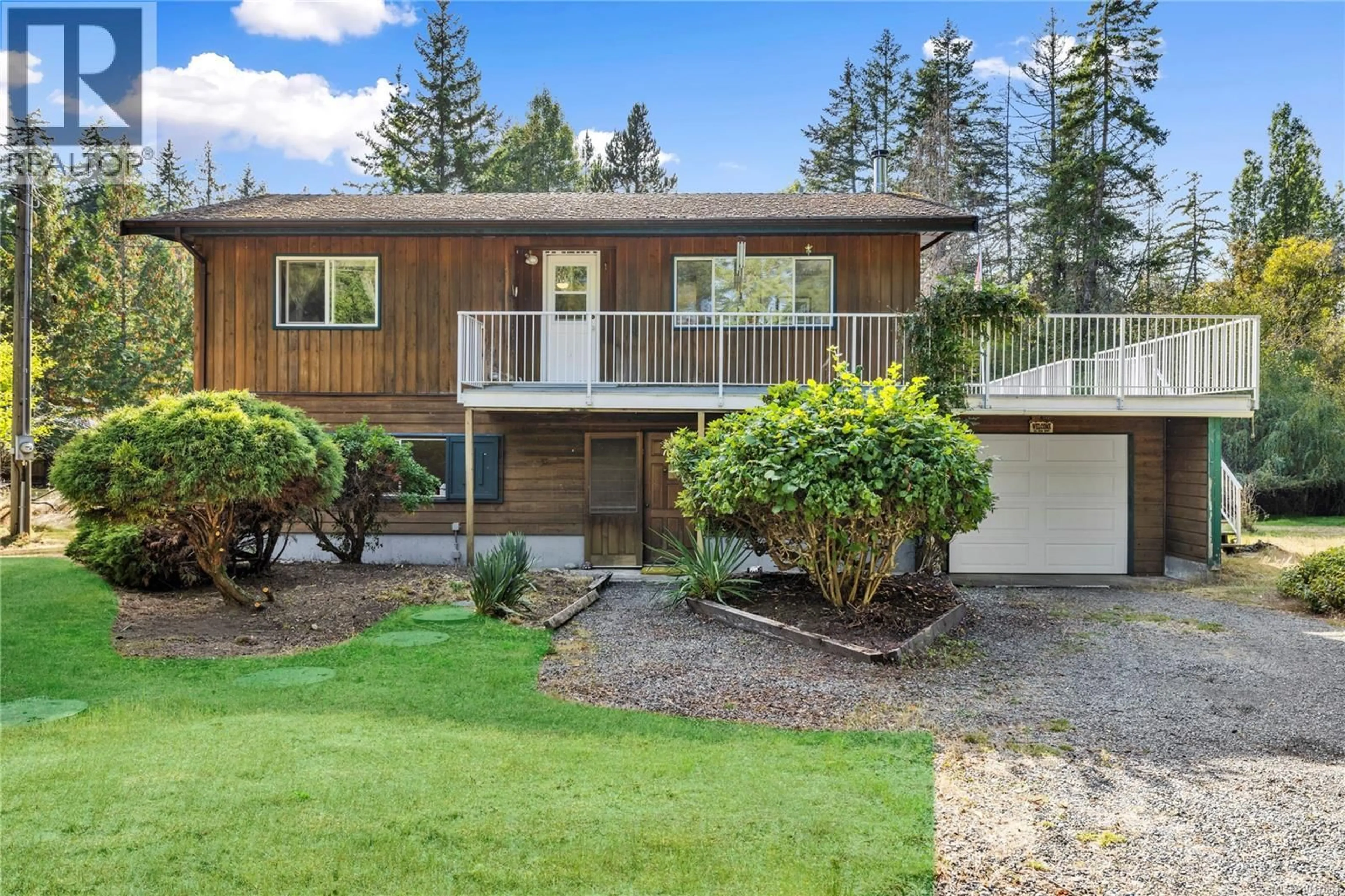 Home with vinyl exterior material, street for 1267 STATION ROAD, Coombs British Columbia V0R1M0