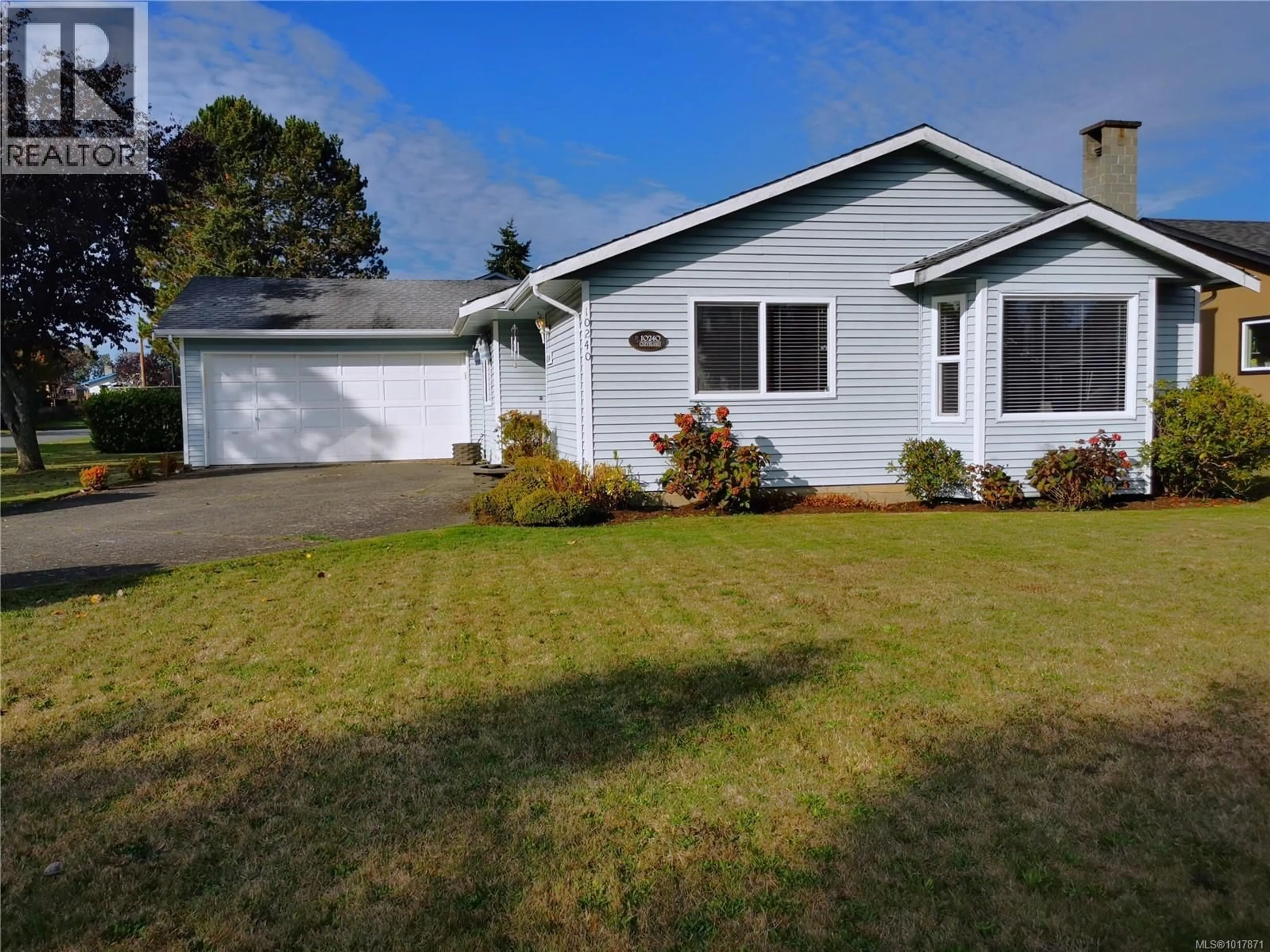Home with vinyl exterior material, street for 10240 CLEVELAND ROAD, Sidney British Columbia V8L4X9
