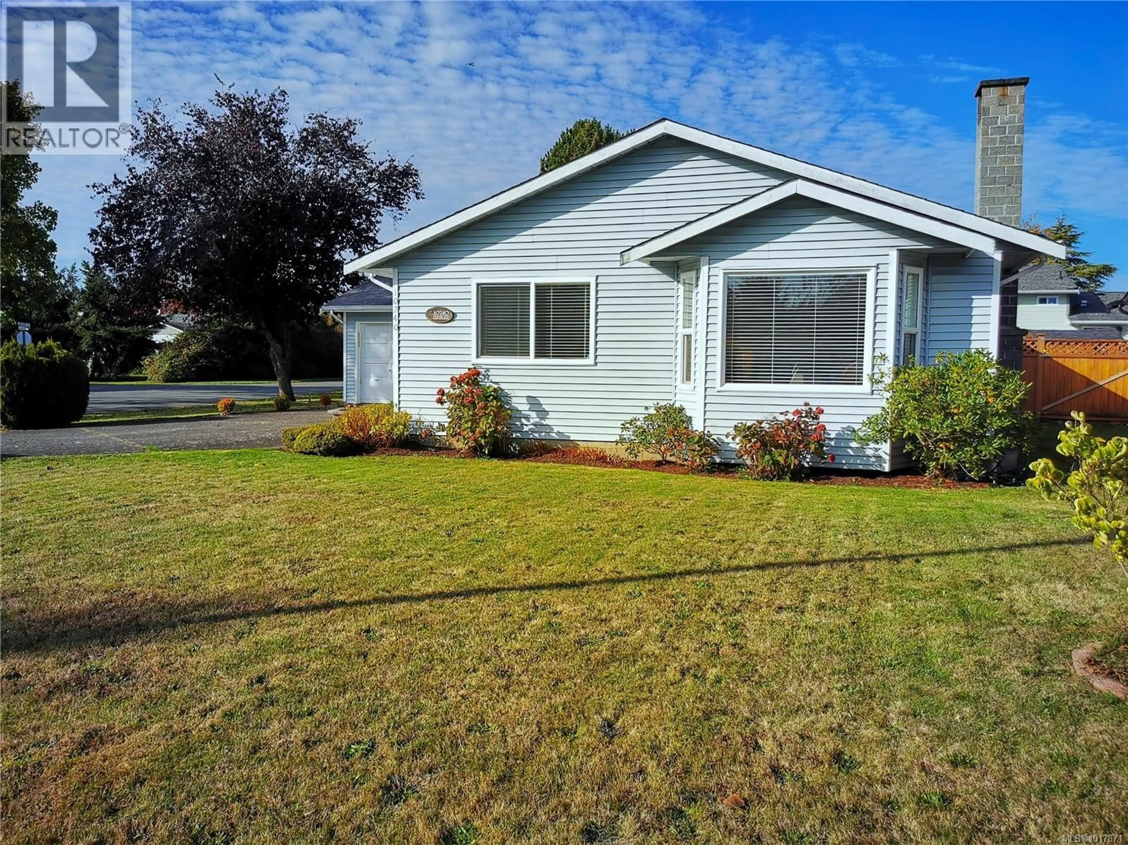 Home with vinyl exterior material, street for 10240 CLEVELAND ROAD, Sidney British Columbia V8L4X9