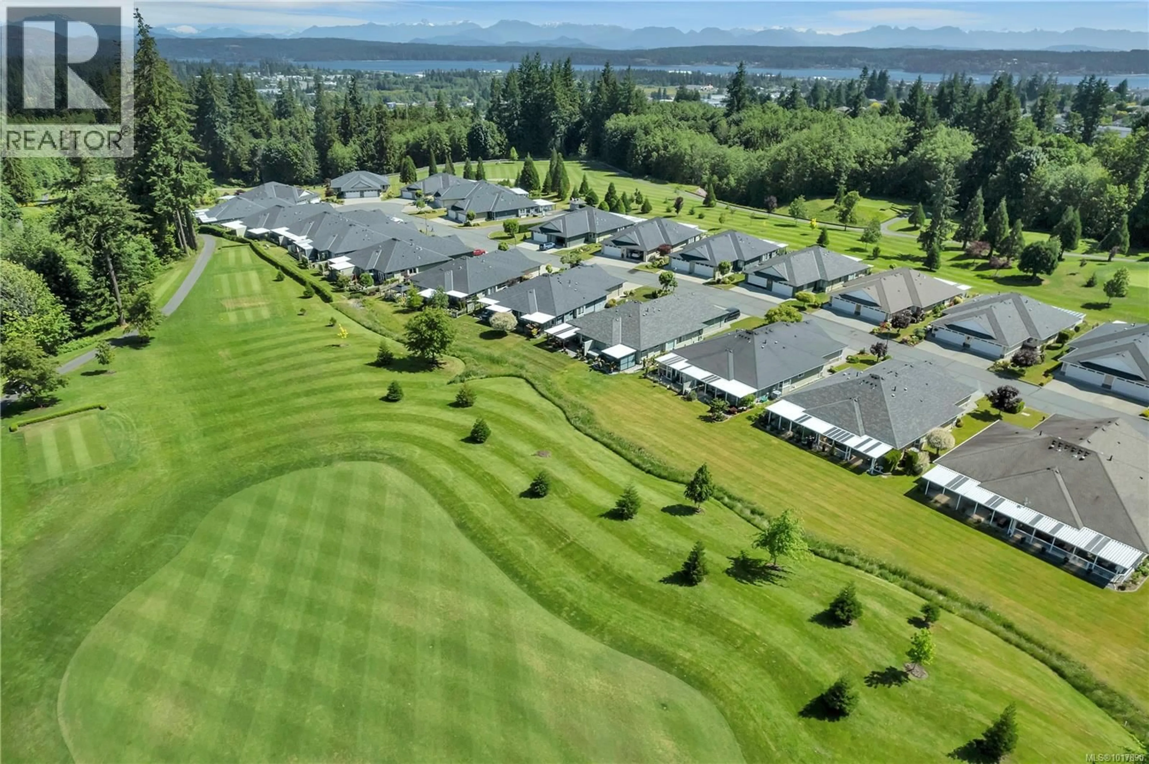 A pic from outside/outdoor area/front of a property/back of a property/a pic from drone, mountain view for 72 - 2006 SIERRA DRIVE, Campbell River British Columbia V9H1V6