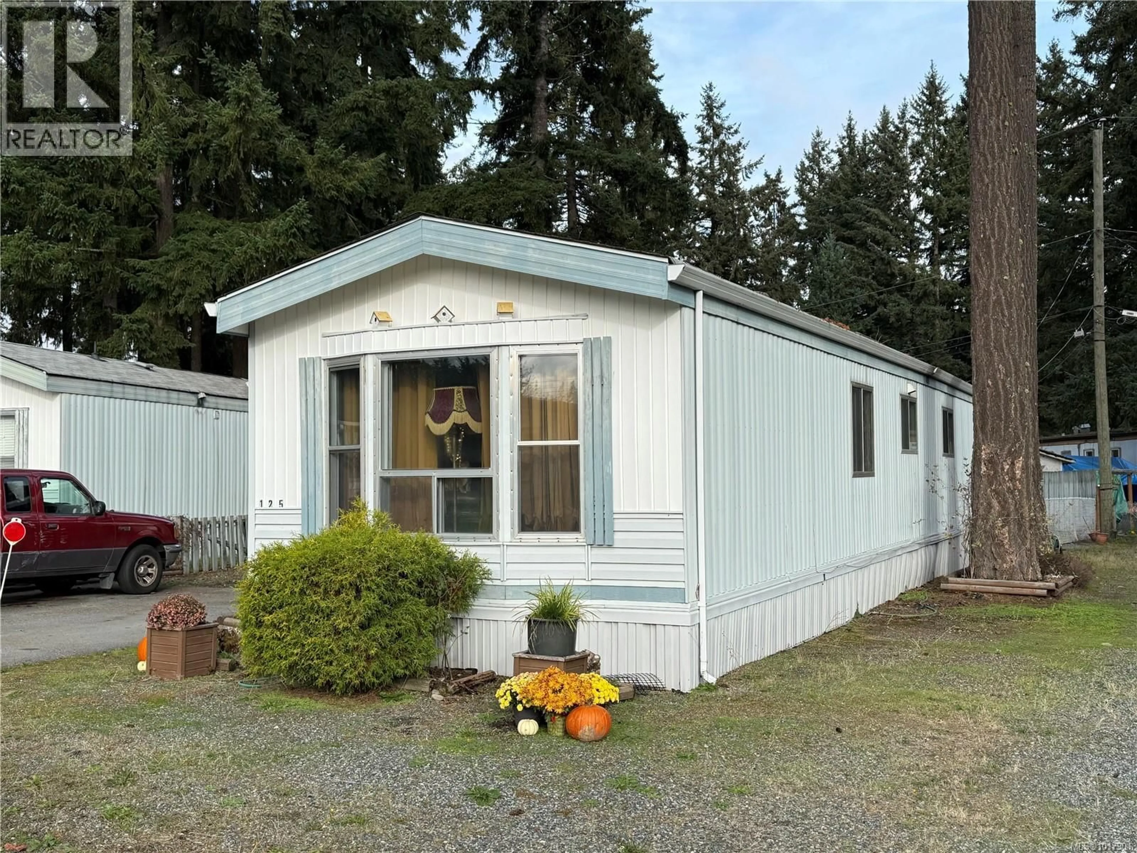 Home with vinyl exterior material, street for 125 - 1736 TIMBERLANDS ROAD, Cassidy British Columbia V9G1K3