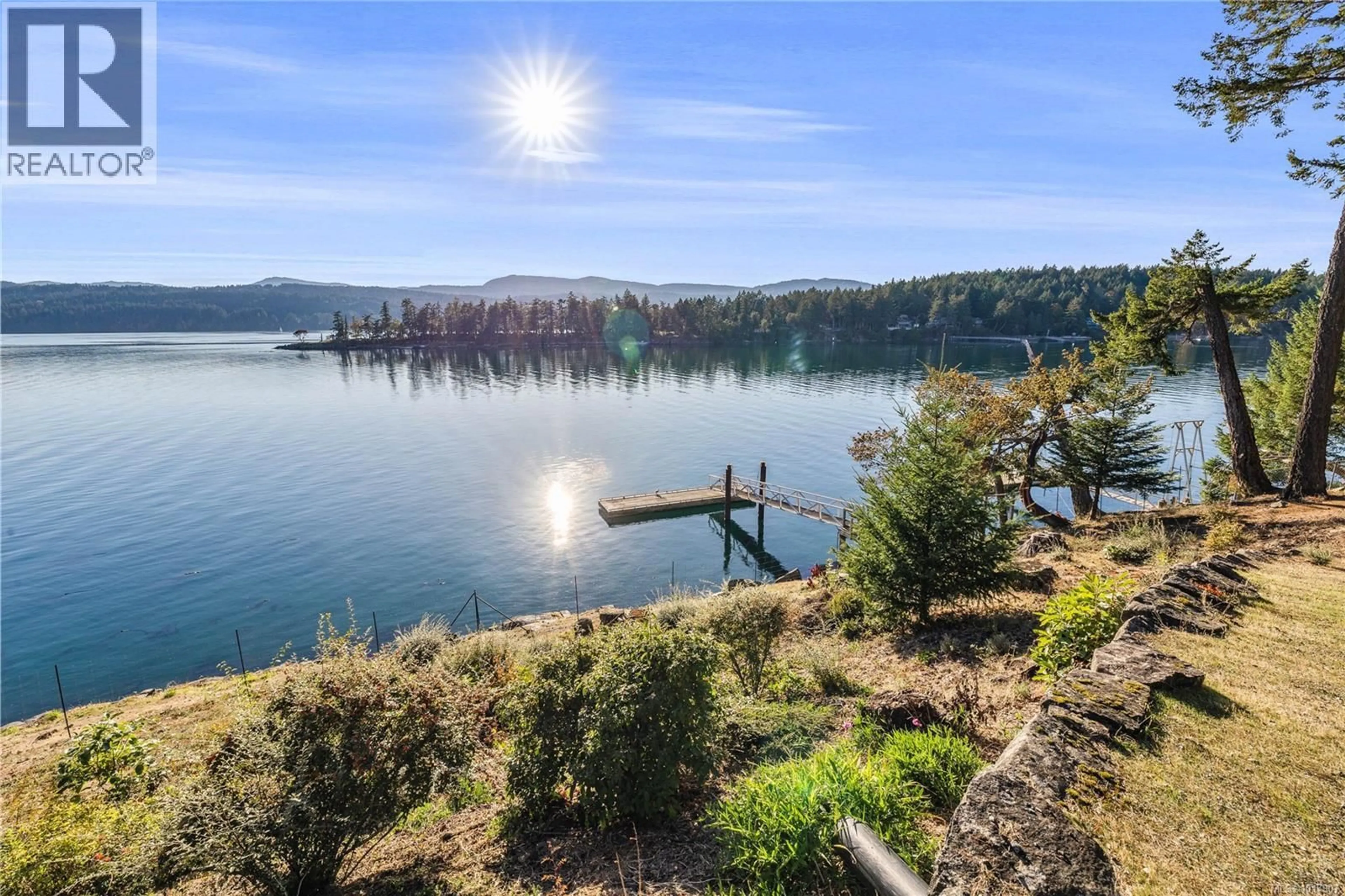 A pic from outside/outdoor area/front of a property/back of a property/a pic from drone, water/lake/river/ocean view for 220 SCOTT POINT DRIVE, Salt Spring British Columbia V8K2R1