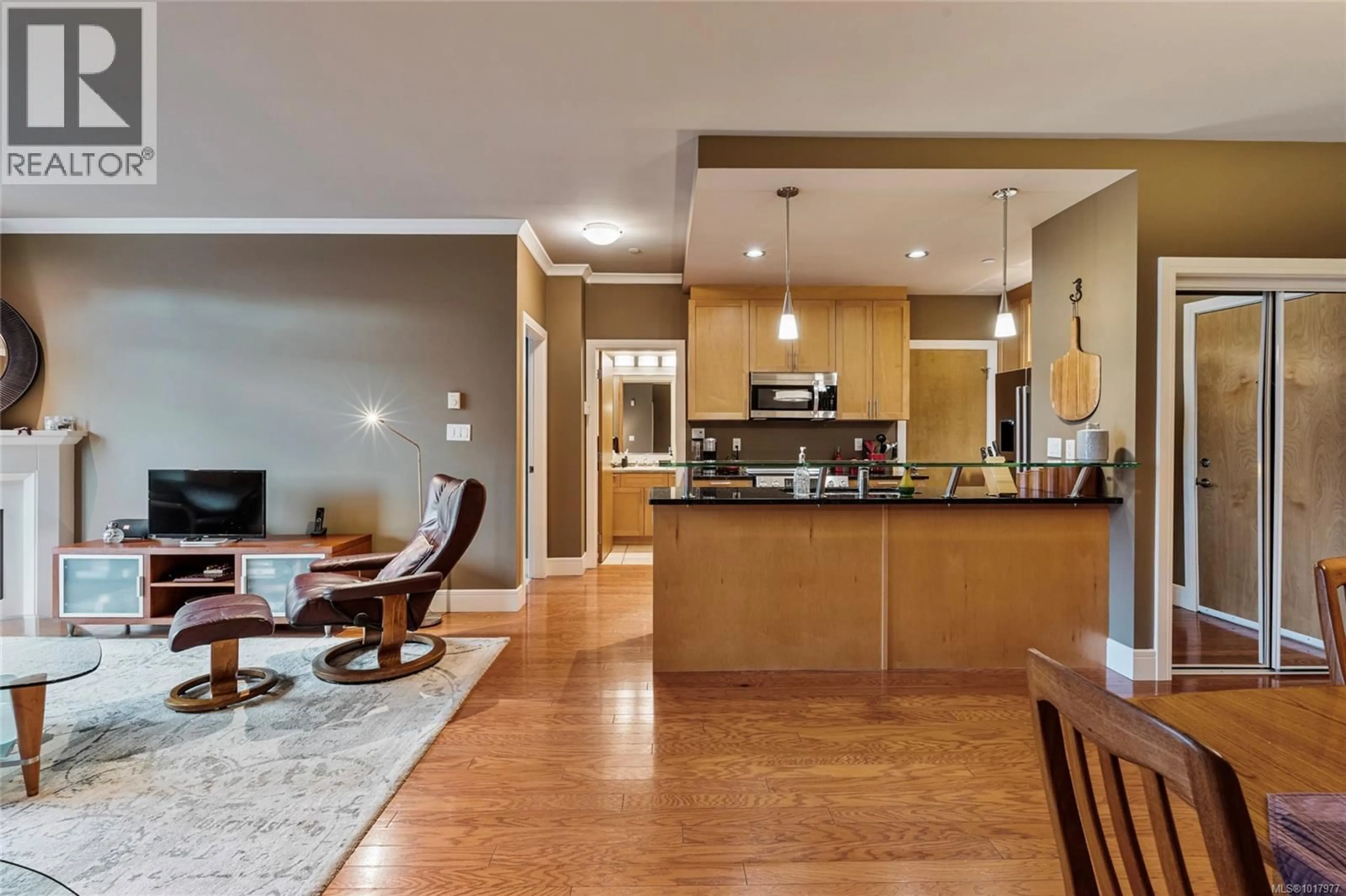 Open concept kitchen, wood/laminate floor for 205 - 769 ARNCOTE AVENUE, Langford British Columbia V9B3E4