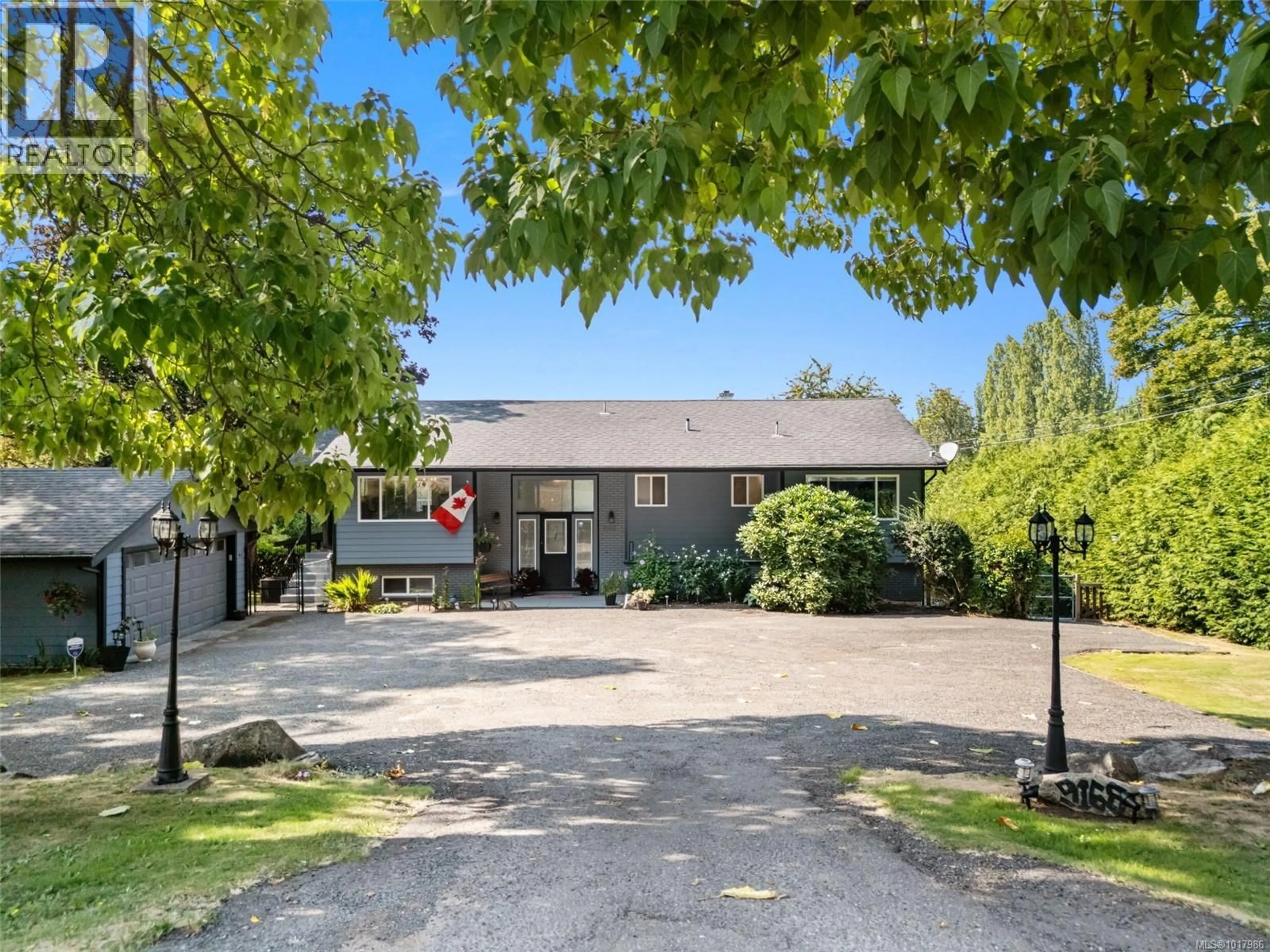 A pic from outside/outdoor area/front of a property/back of a property/a pic from drone, street for 9168 WEST SAANICH ROAD, North Saanich British Columbia V8L5T4