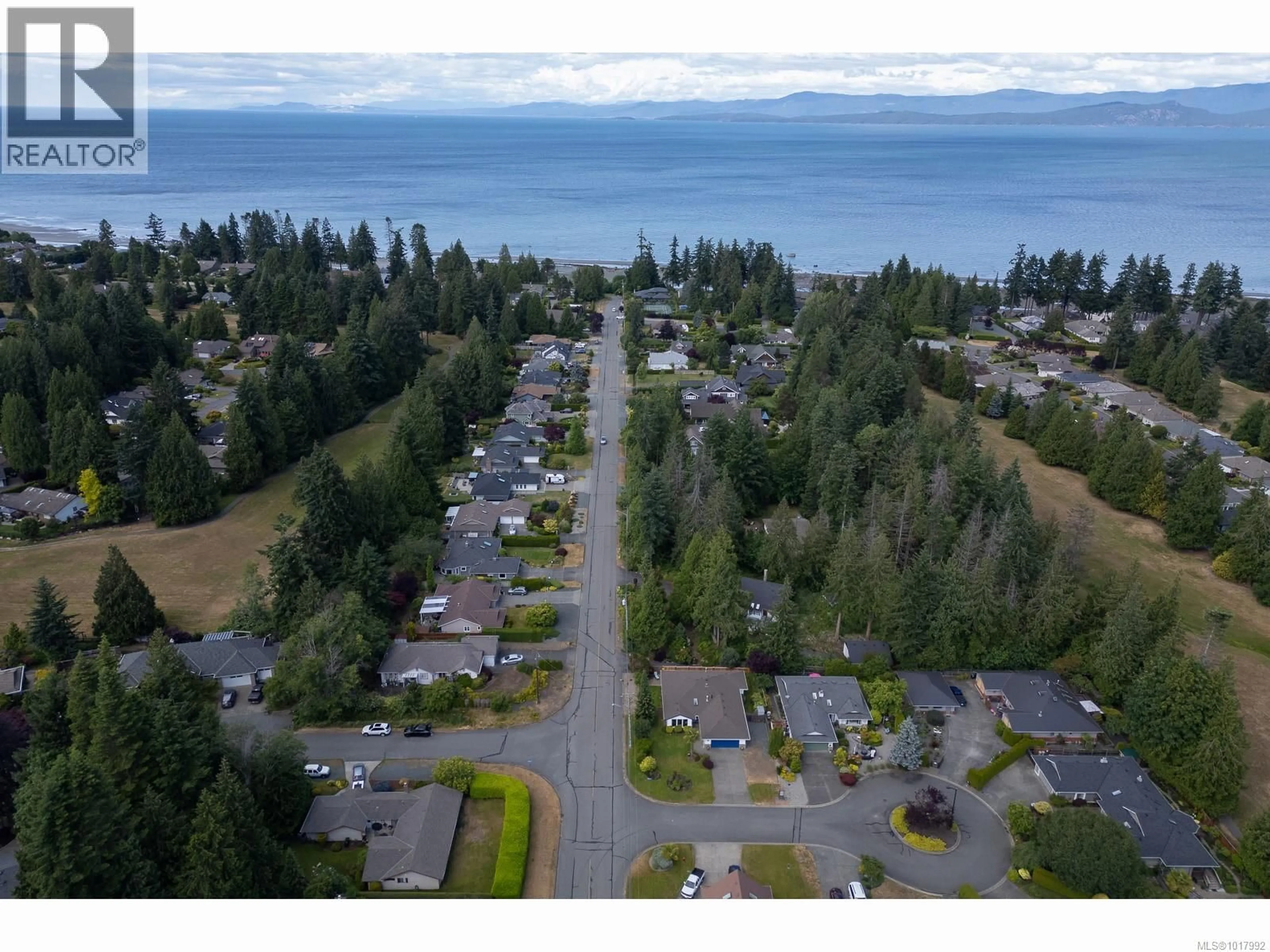 A pic from outside/outdoor area/front of a property/back of a property/a pic from drone, water/lake/river/ocean view for 1221 GREEN CLOSE, Qualicum Beach British Columbia V9K2M3